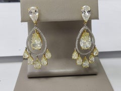 7.82 Carat Pear Shape Intense Fancy Yellow Diamond 18K Gold Drop Earrings
