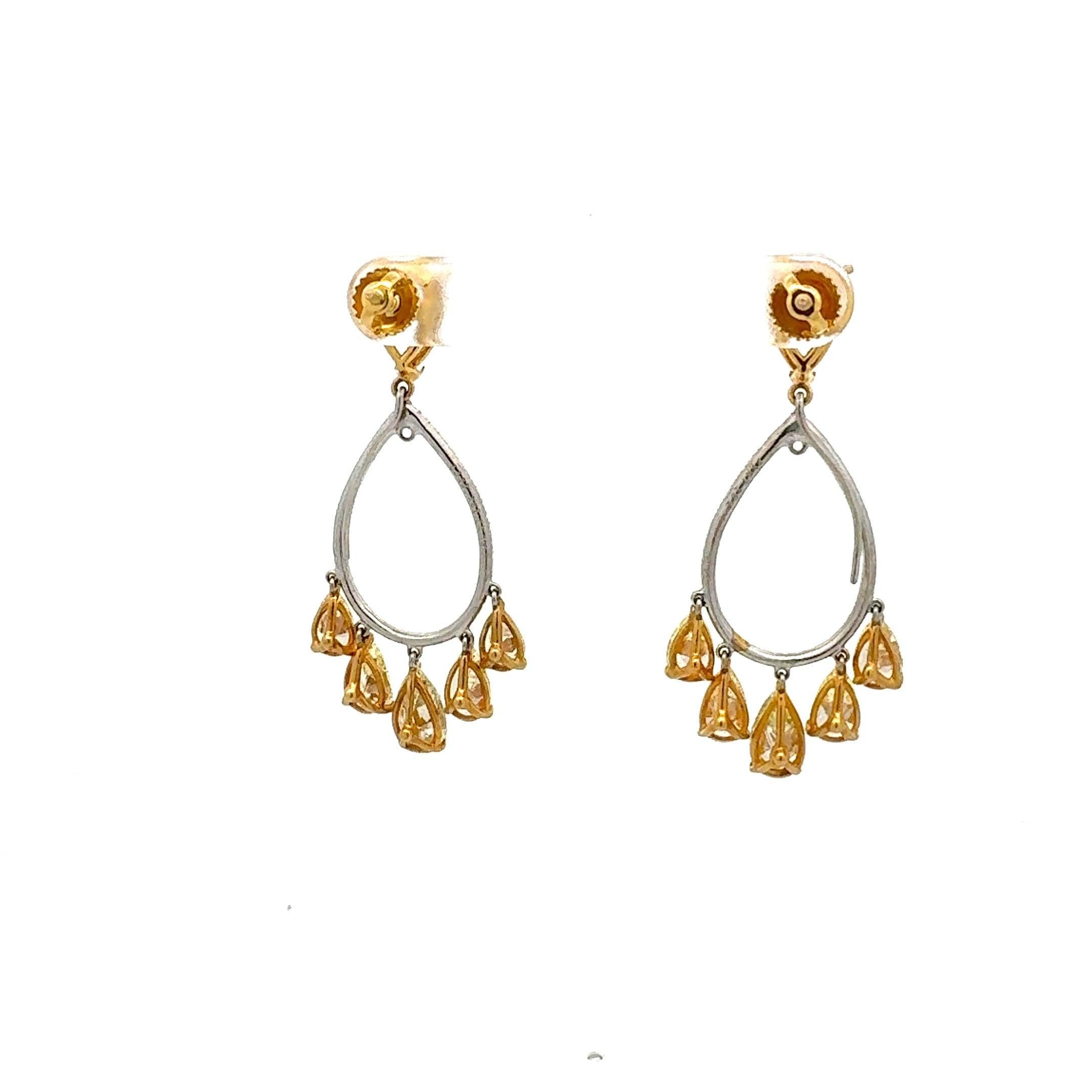 Pear Cut 7.82 Carat Pear Shape Intense Fancy Yellow Diamond 18K Gold Drop Earrings For Sale