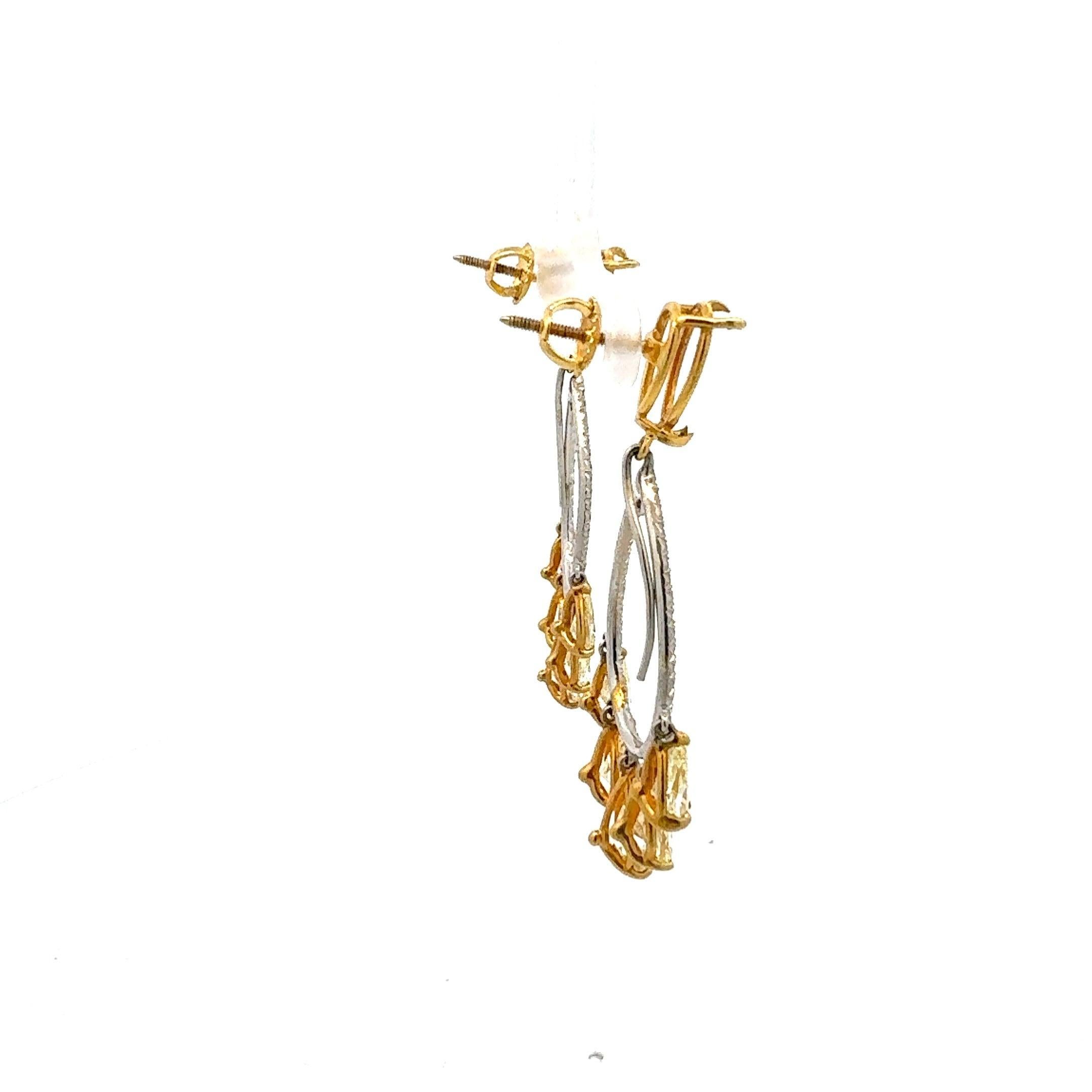 7.82 Carat Pear Shape Intense Fancy Yellow Diamond 18K Gold Drop Earrings In Good Condition For Sale In New York, NY