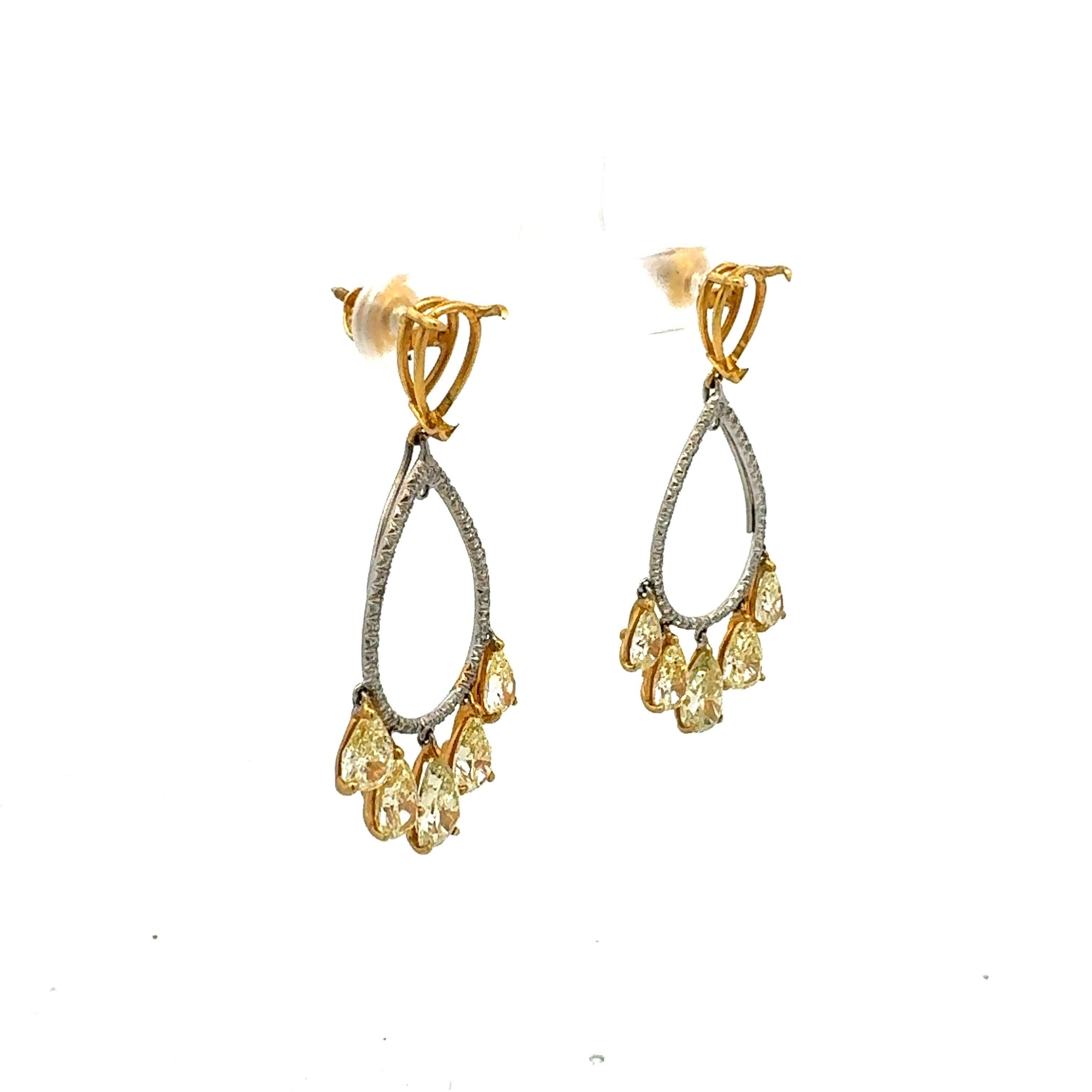 Women's 7.82 Carat Pear Shape Intense Fancy Yellow Diamond 18K Gold Drop Earrings For Sale