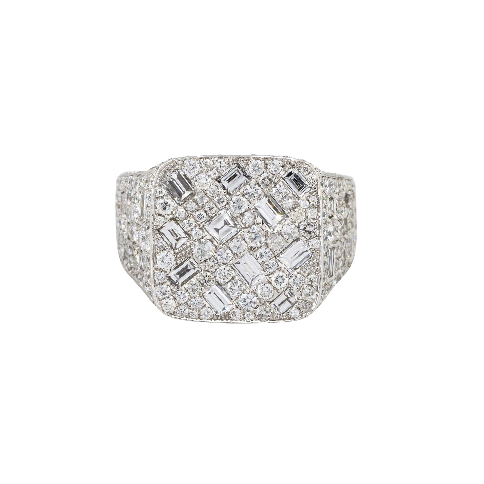 Material: 14k White Gold
Diamond Details: Approx. 7.82ctw of round & baguette cut Diamonds. Diamonds are G/H in color and VS in clarity
Size: 10 
Measurements: 26mm x 17.70mm x 29mm
Weight: 16.5g (10.7dwt)
Additional Details: This item comes with a