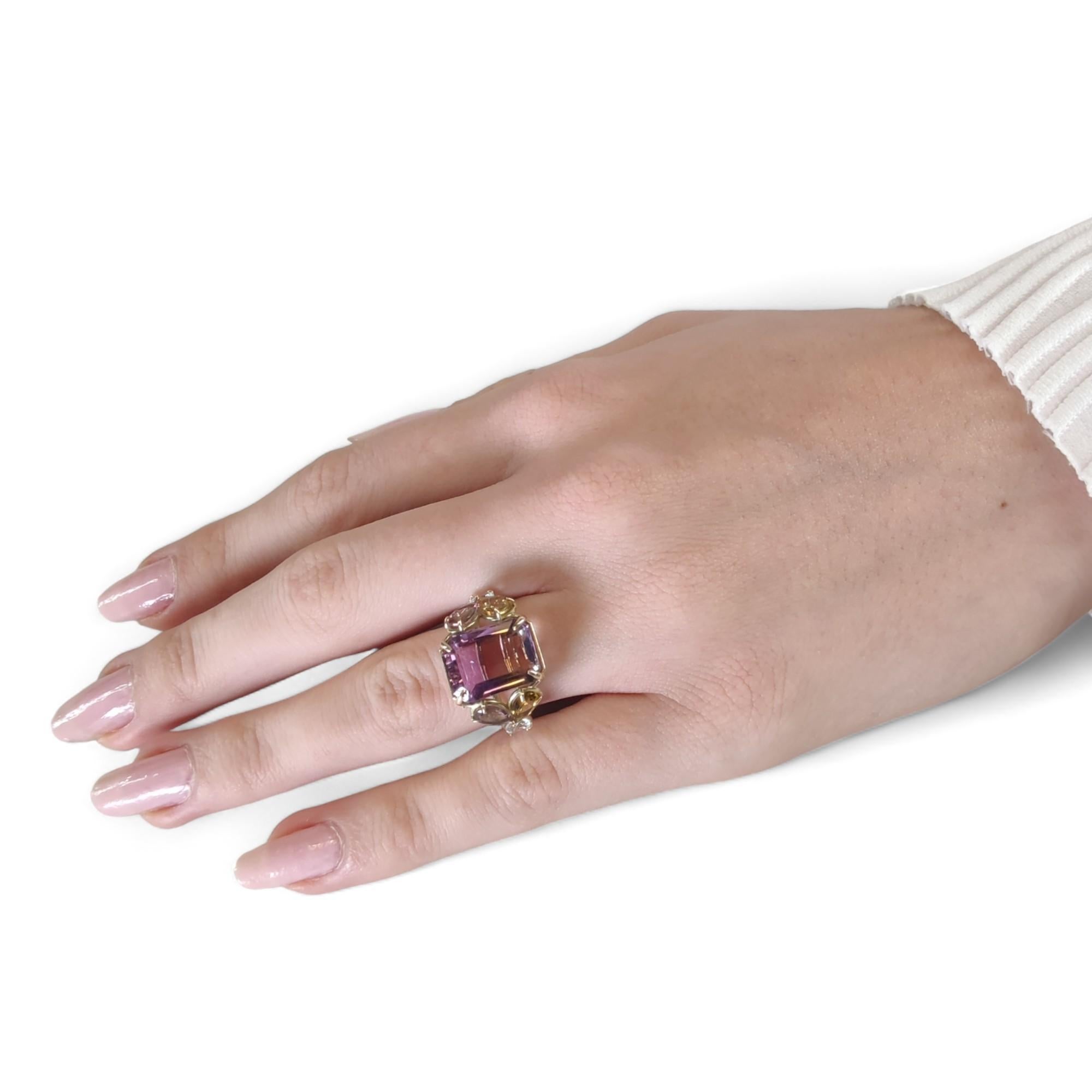 The 14K Gold Ring adorned with Ametrine and Tourmaline is a spectacular example of sculptural elegance, meticulously handcrafted for those with an appreciation for unique, contemporary design and the allure of mixed gemstones.

Technical