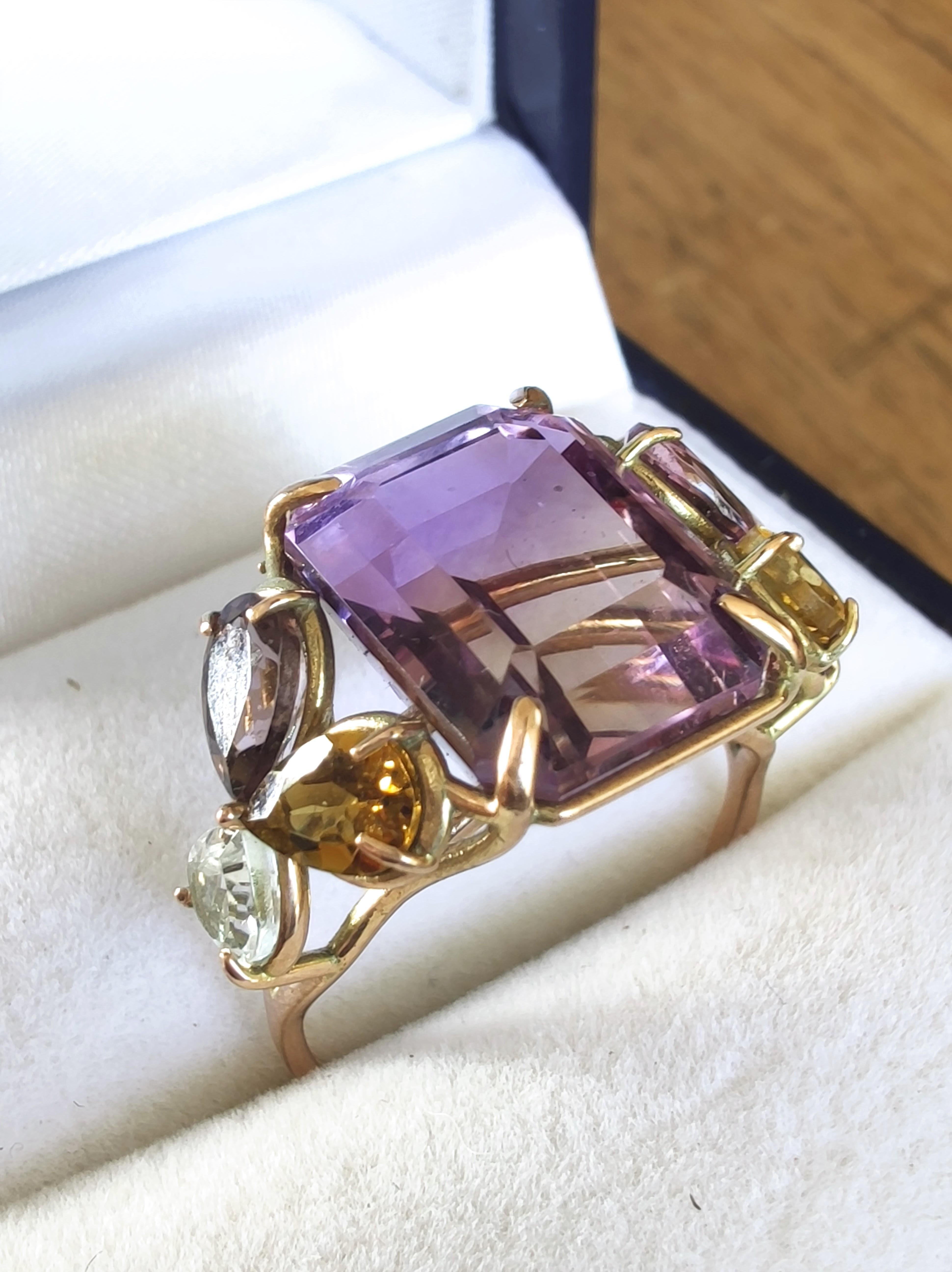 7.82ct Ametrine Tourmaline Aquamarine Cocktail Ring in 14K Gold – Unique Handmade Design
This one-of-a-kind women’s cocktail ring is a sculptural celebration of nature, color, and craftsmanship. Entirely handmade in 14K yellow gold, it features a