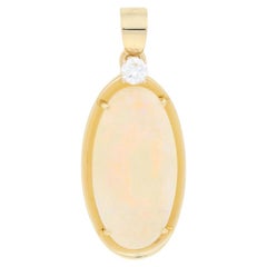 7.83 Carat Oval Cabochon Cut Opal and Diamond Pendant, 18 Karat Yellow Gold
