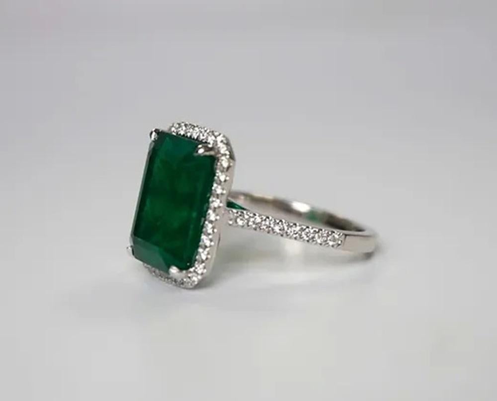 Emerald Cut 7.84 Carat Emerald Halo Ring For Sale