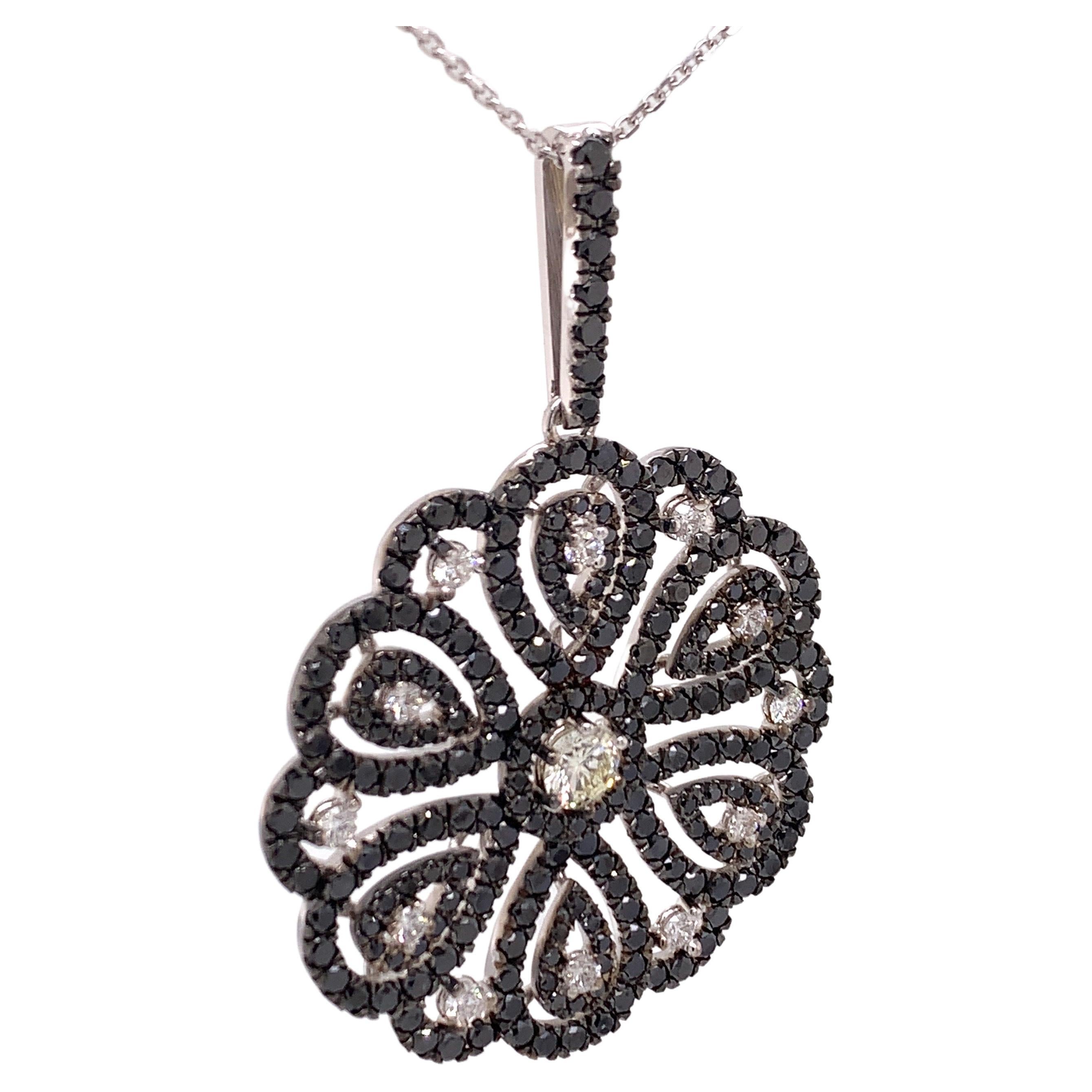 7.84 Carat Flower Pendant with Black & White Diamonds For Sale