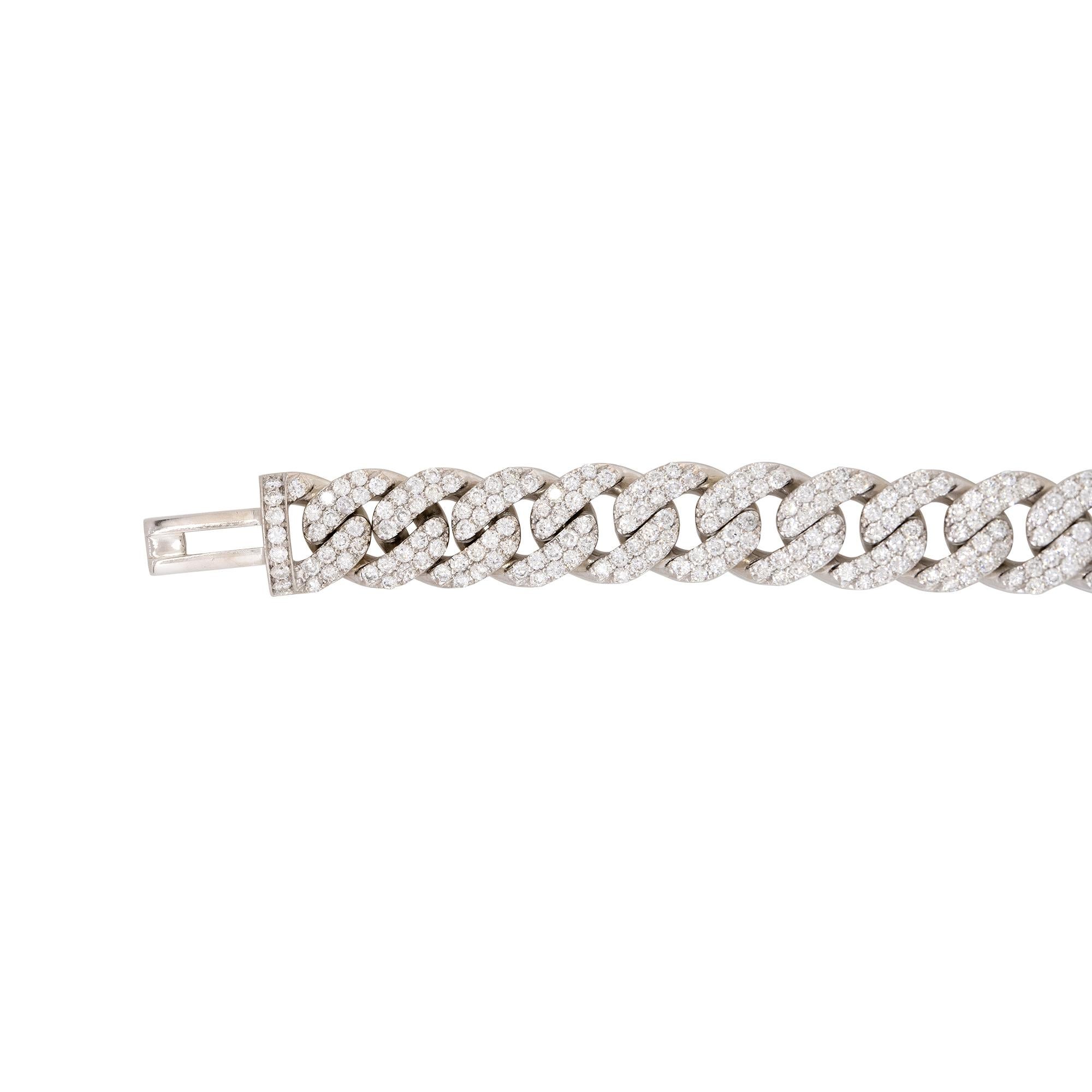 Everyone should take notice of this classic Cuban link bracelet as this particular bracelet is made from 14 karat white gold and is pave set with 7.84 carats of round brilliant cut diamonds that are near colorless. This bracelet measures