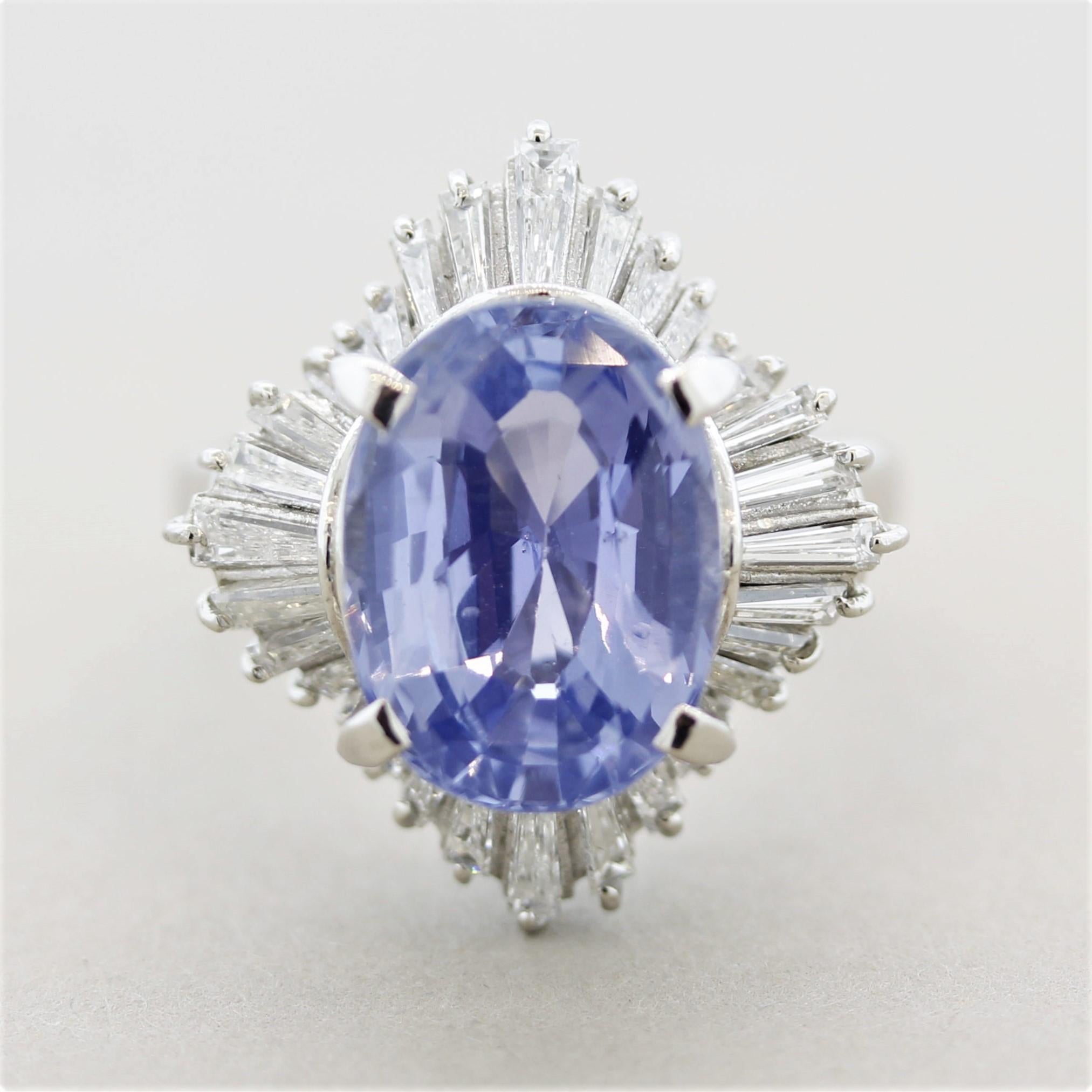 A large and impressive blue sapphire weighing 7.84 carats takes center stage! The oval-shaped gem has a bright and brilliant light-blue color that shines brightly. The sapphire is certified by the GIA as natural with no treatments at all, same as
