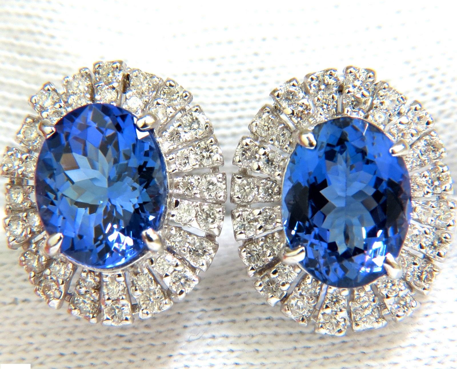 Glamour of Tanzanites


 6.58ct. Natural Fine Violetish blue tanzanite

Clean clarity, full oval cut and transparent.
Gorgeous intense vivid hue

10.5 X 8mm each.



1.00ct. diamonds on side 

G-color Vs-2 clarity

Rounds and full