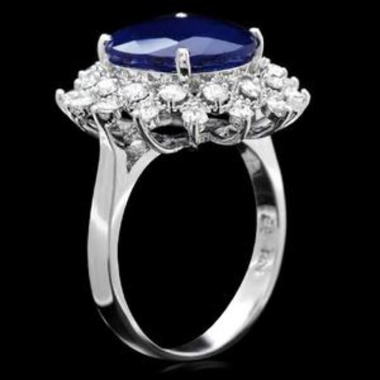 7.85 Carats Exquisite Natural Blue Sapphire and Diamond 14K Solid White Gold Ring

Total Blue Sapphire Weight is: 7.00 Carats (Treated)

Sapphire Measures: 13 x 10mm

Natural Round Diamonds Weight: .85 Carats (color G / Clarity SI1)

Ring size: 7