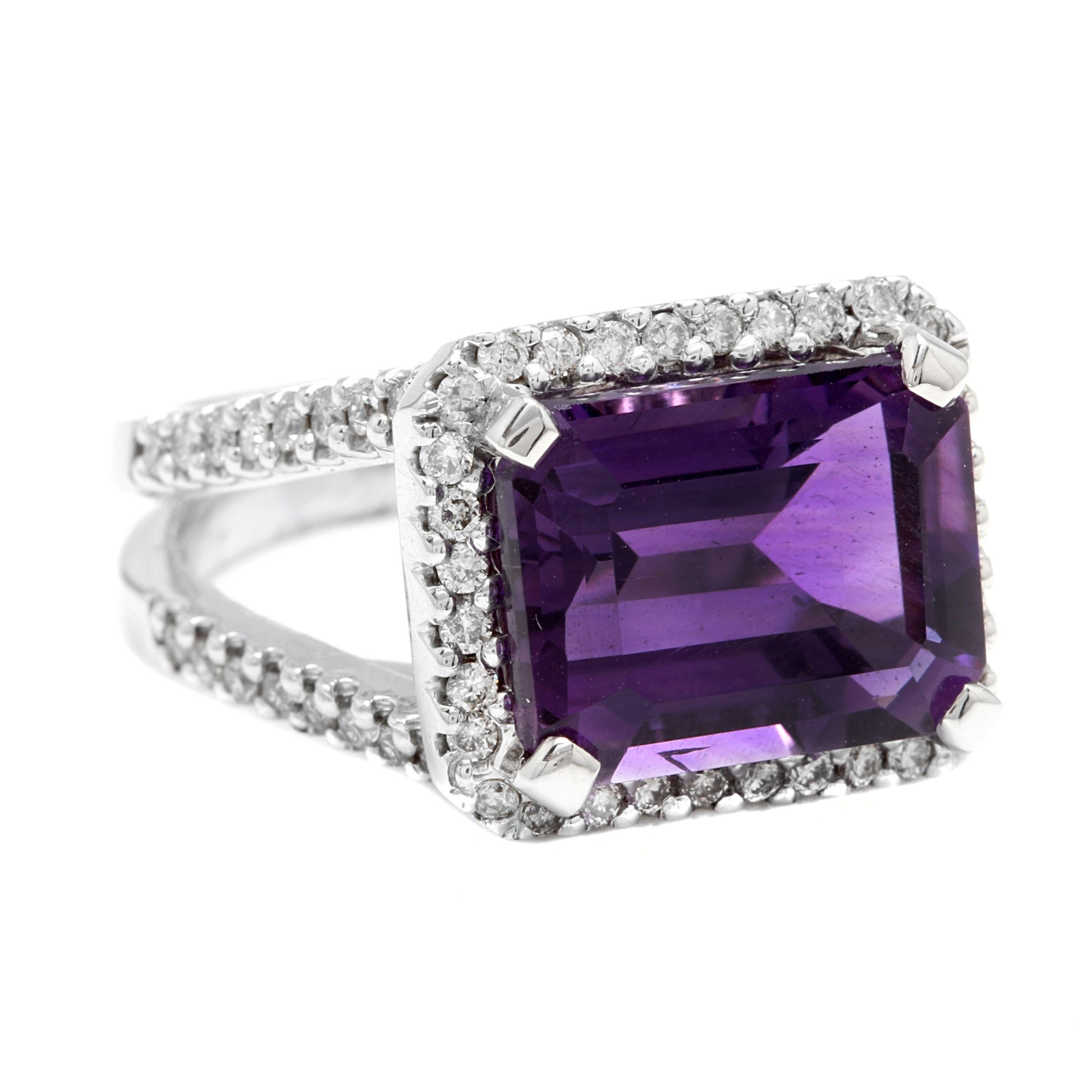 7.85 Carats Natural Amethyst and Diamond 14K Solid White Gold Ring

Total Natural Emerald Cut Amethyst Weights: Approx. 7.00 Carats

Amethyst Measures: Approx. 13.00 x 10.00mm

Natural Round Diamonds Weight: Approx. 0.85 Carats (color G-H /Clarity