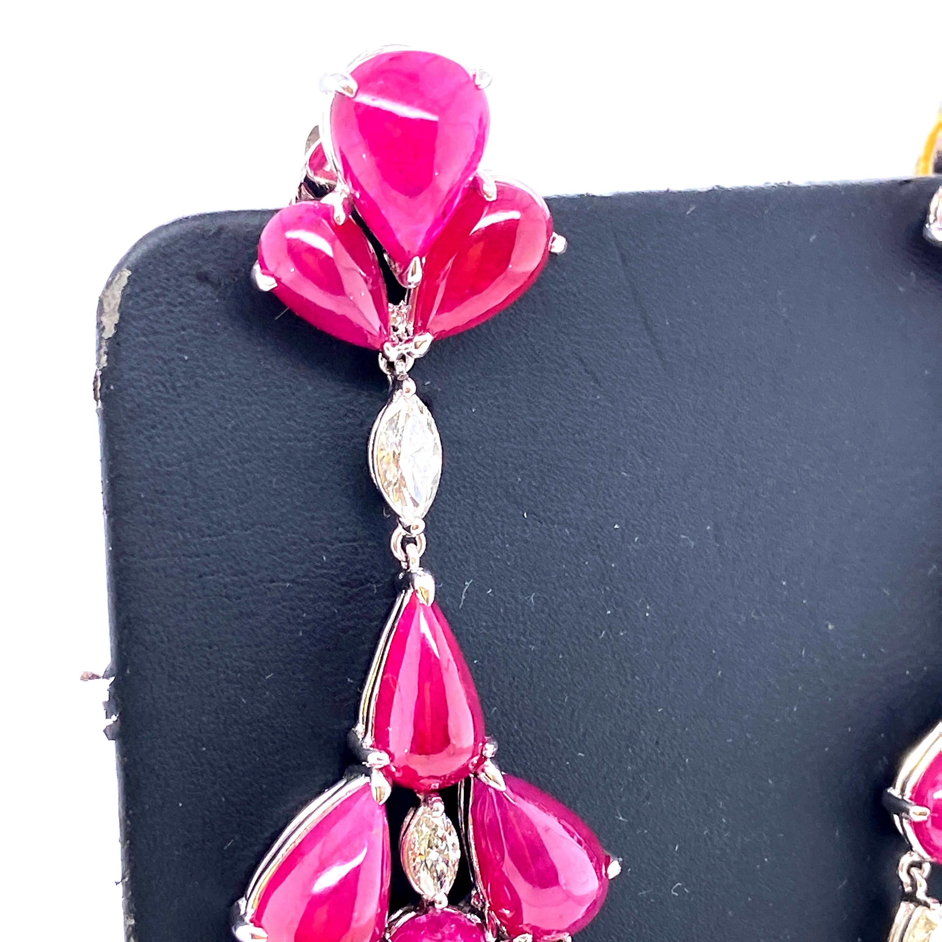 Contemporary 78.50 Carat Natural Ruby Cabochons and White Diamond Gold Chandelier Earrings For Sale