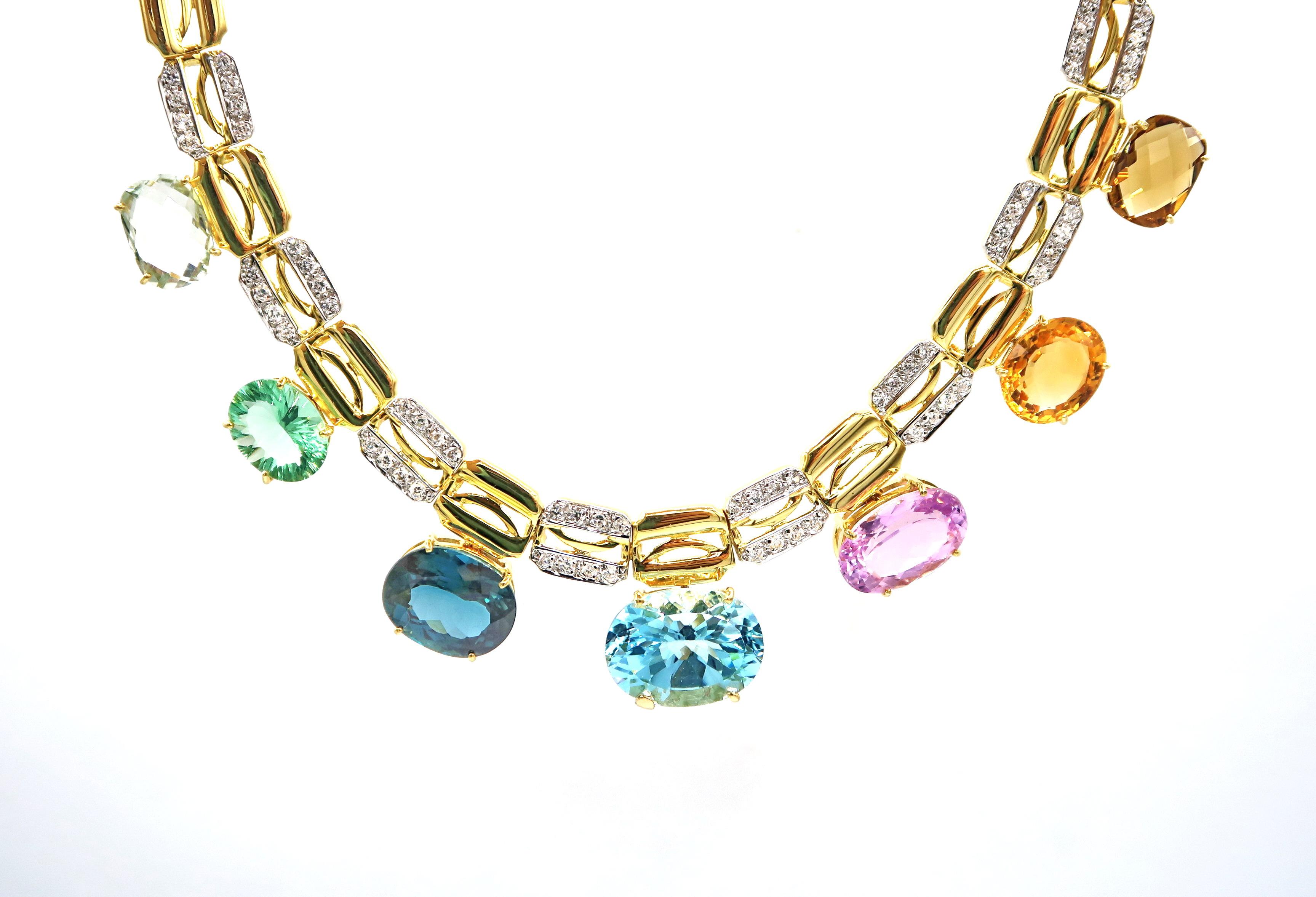 78.51 Carat Multicolour Semi Precious Gemstone 18K Yellow Gold Necklace embellished with White Zircon

Length : 16