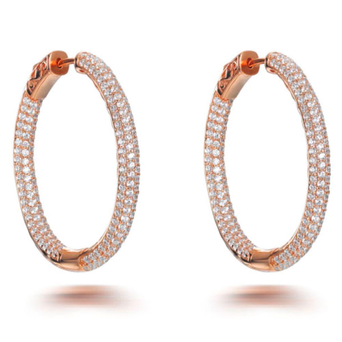 A twist on the wardrobe staple, these shimmering hoop earrings will add a sparkling statement to any occasion.

Featuring 7.86ct of round brilliant cut cubic zirconia, set in 925 sterling silver with a 14kt rose gold finish.

Dimensions 35mm drop by