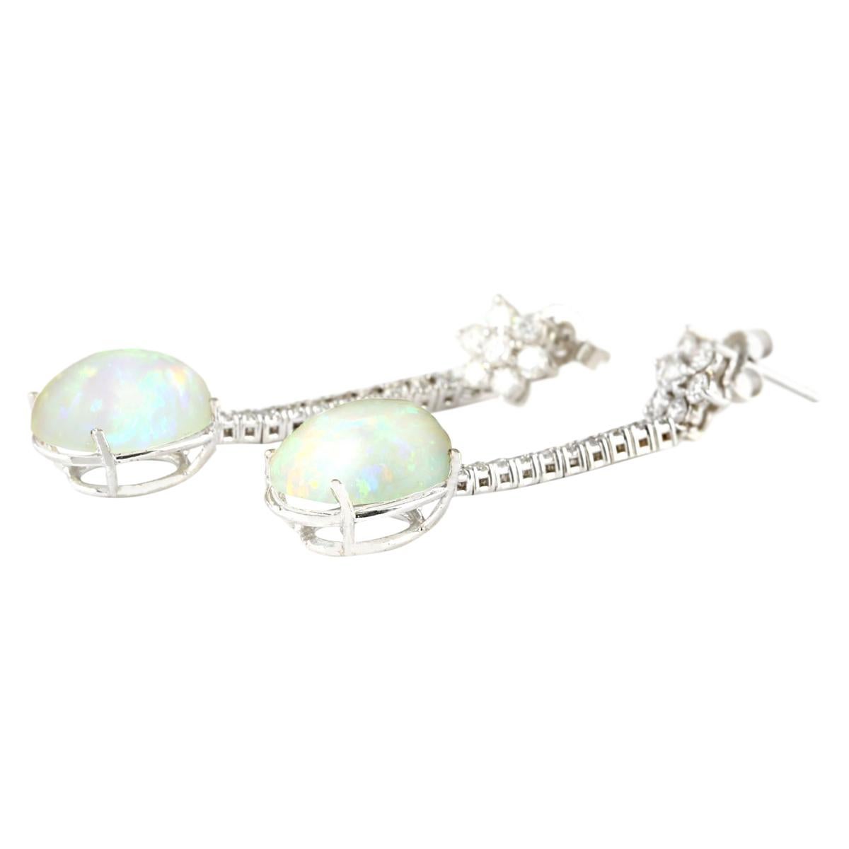 7.87 Carat Natural Opal 14 Karat White Gold Diamond Earrings
Stamped: 14K White Gold
Total Earrings Weight: 5.3 Grams
Earrings Length: 1.60 Inches
Total Natural Opal Weight is 6.87 Carat (Measures: 14.00x10.00 mm)
Color: Multicolor
Total Natural