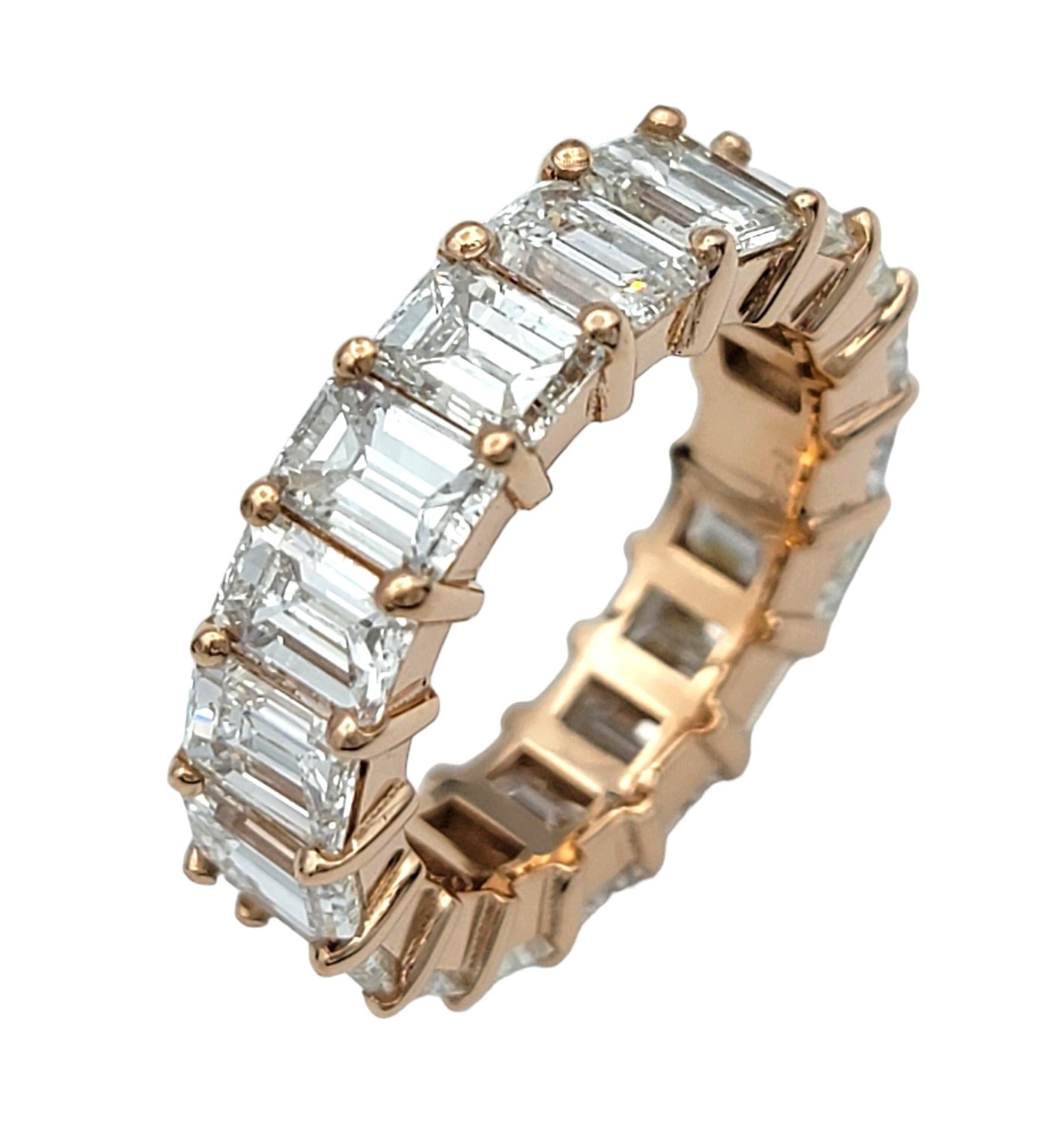 Ring Size: 5 

Introducing our absolutely breathtaking emerald cut diamond full eternity ring, masterfully crafted in 14 karat rose gold. This exquisite piece is a perfect blend of timeless elegance and modern sophistication, designed to captivate