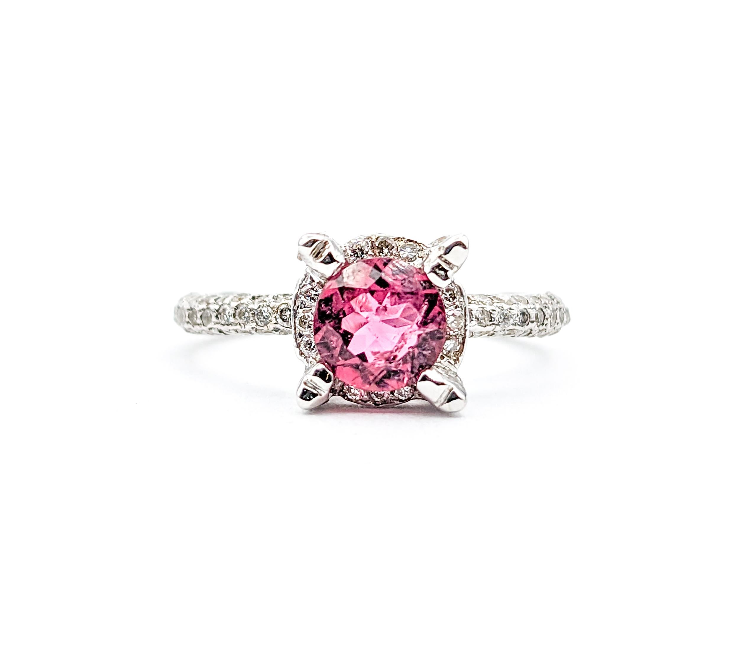.78ct Pink Tourmaline & .75ctw Diamonds Ring In White Gold

Introducing this fun pink Tourmaline Ring, elegantly crafted in 14k white gold, featuring .75ctw of shimmering Diamonds with SI2-I1 clarity. At the heart of this stunning piece lies a .78ct