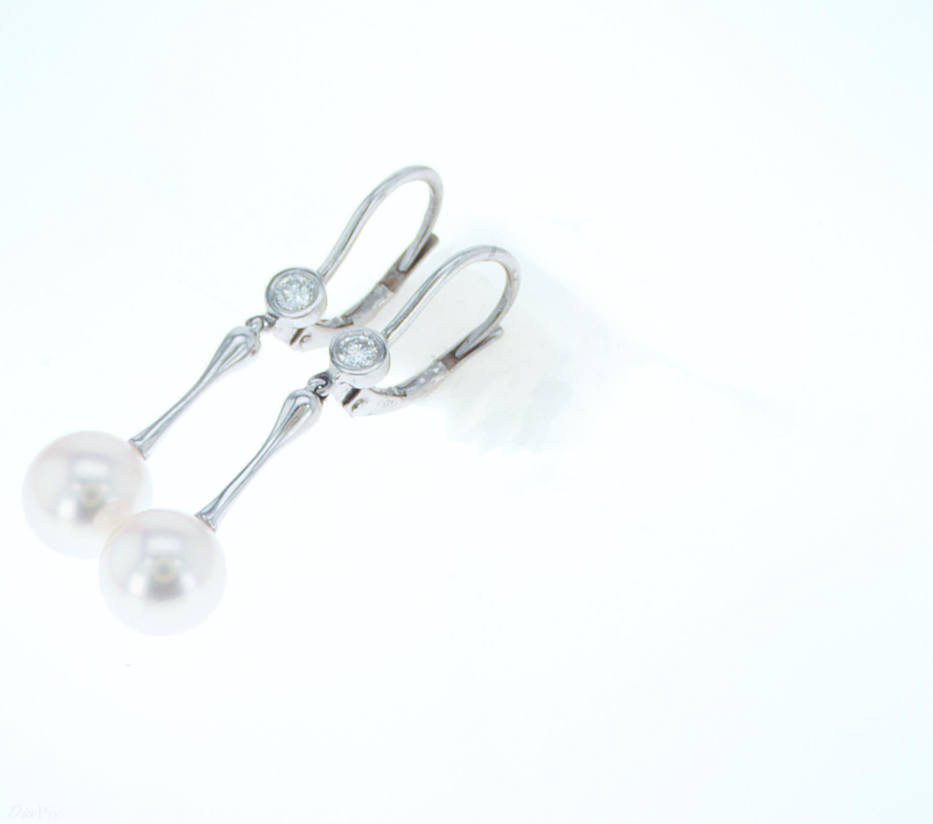 Modern Pearl Dangle Earrings with Diamond Accenting For Sale