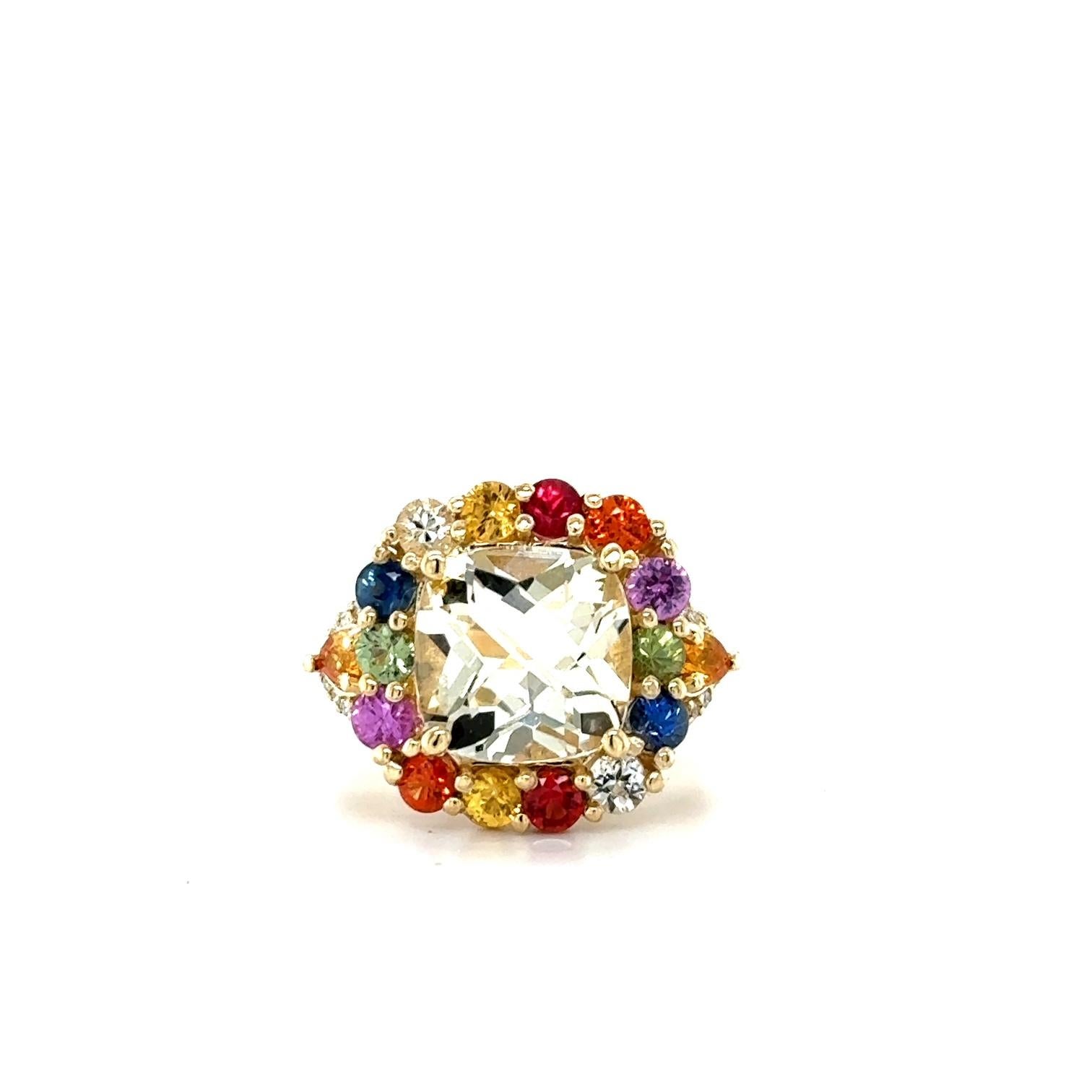 7.90 Carat Citrine Multi-Color Sapphire Diamond Yellow Gold Cocktail Ring

This gorgeous ring has a beautiful Cushion Cut Champagne Citrine Quartz weighing 4.73 Carats and is surrounded by 14 Multi-Color Sapphires weighing 2.20 Carats and 26 Round
