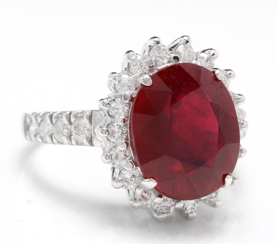 7.90 Carats Impressive Natural Red Ruby and Diamond 14K White Gold Ring

Total Red Ruby Weight is: Approx. 7.00 Carats

Ruby Measures: Approx. 12.00 x 10.00mm

Ruby Treatment: Lead Glass Filling

Natural Round Diamonds Weight: Approx. 0.90 Carats