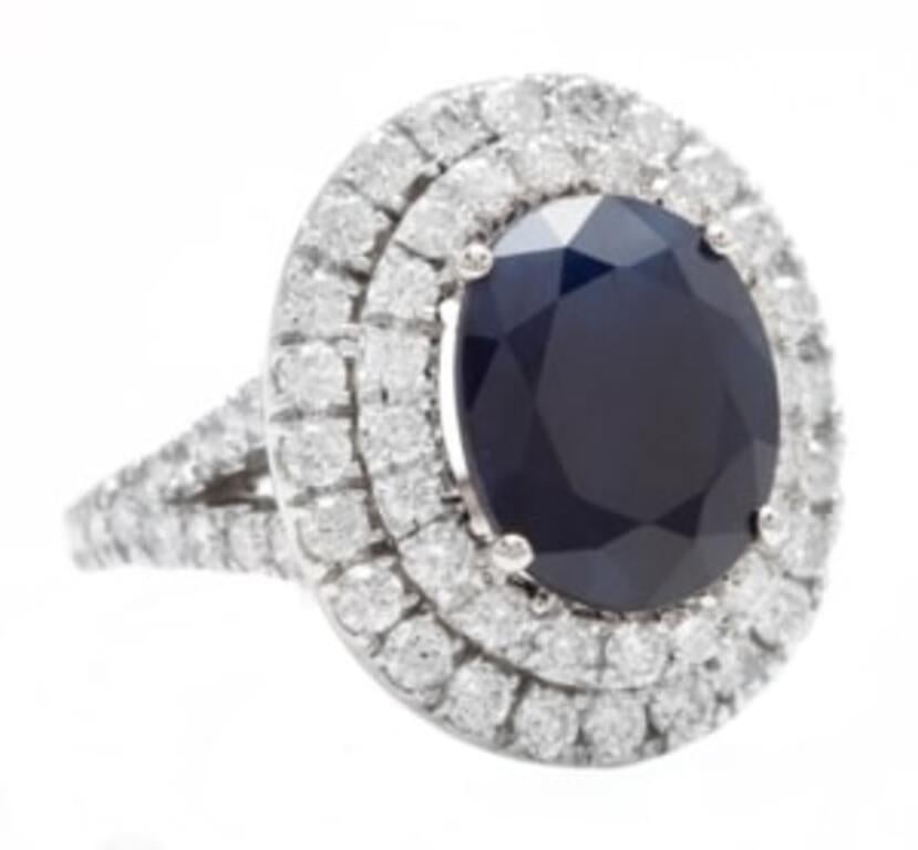 7.90 Carats Exquisite Natural Blue Sapphire and Diamond 14K Solid White Gold Ring

Total Blue Sapphire Weight is: Approx. 6.00 Carats

Sapphire Measures: Approx. 12 x 10mm

Sapphire Treatment: Diffusion

Natural Round Diamonds Weight: Approx. 1.90