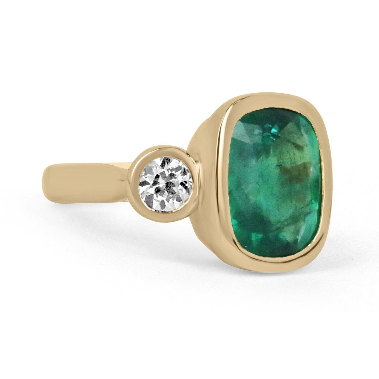 Make a statement with this remarkable emerald and diamond three-stone ring. The center stone features an exquisite AAA rare top 7.22-carat, natural cushion cut emerald from the origins of Zambia. This divine stone is a rare treasure due to its