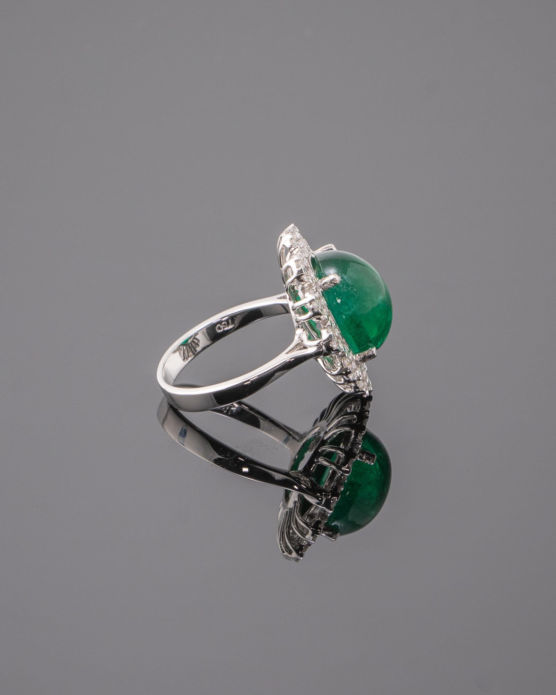A stunning Zambian Emerald cabochon and Diamond ring, set in solid 18K White Gold. Size US 6, but can be changed.
Please feel free to message us if you have any queries. 
Free shipping provided. Returns accepted. 

Stone Details: 
Stone: Zambian
