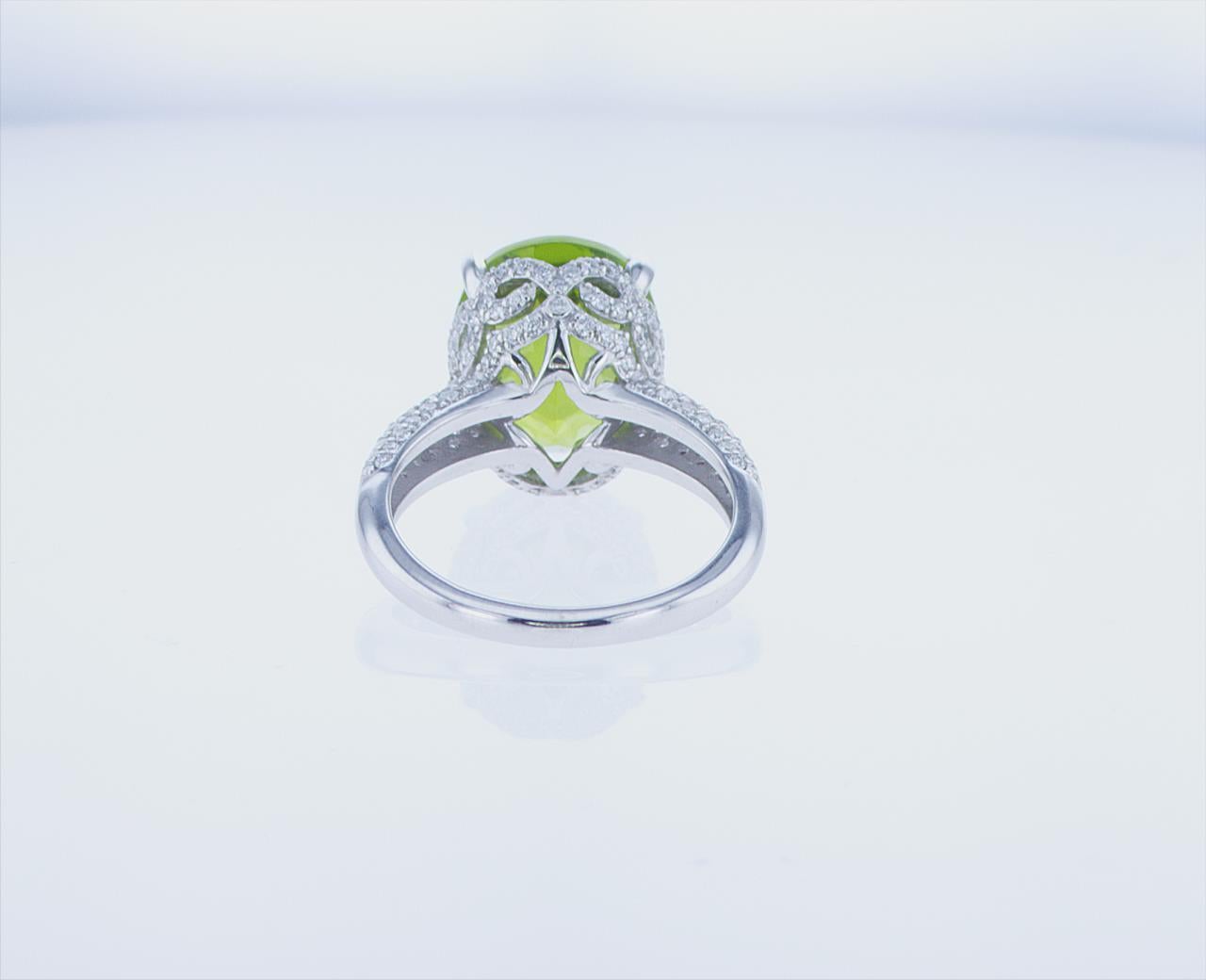 Oval Cut 7.93 Carat Oval Peridot Cocktail Ring in 18k White Gold with Palladium For Sale