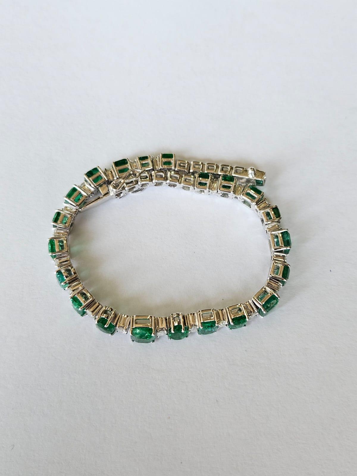 A very beautiful and gorgeous, modern style, Emerald Tennis Bracelet set in 18K White Gold & Diamonds. The weight of the Emeralds is 7.93 carats. The Emeralds are completely natural, without any treatment and are of Zambian origin, The Diamonds