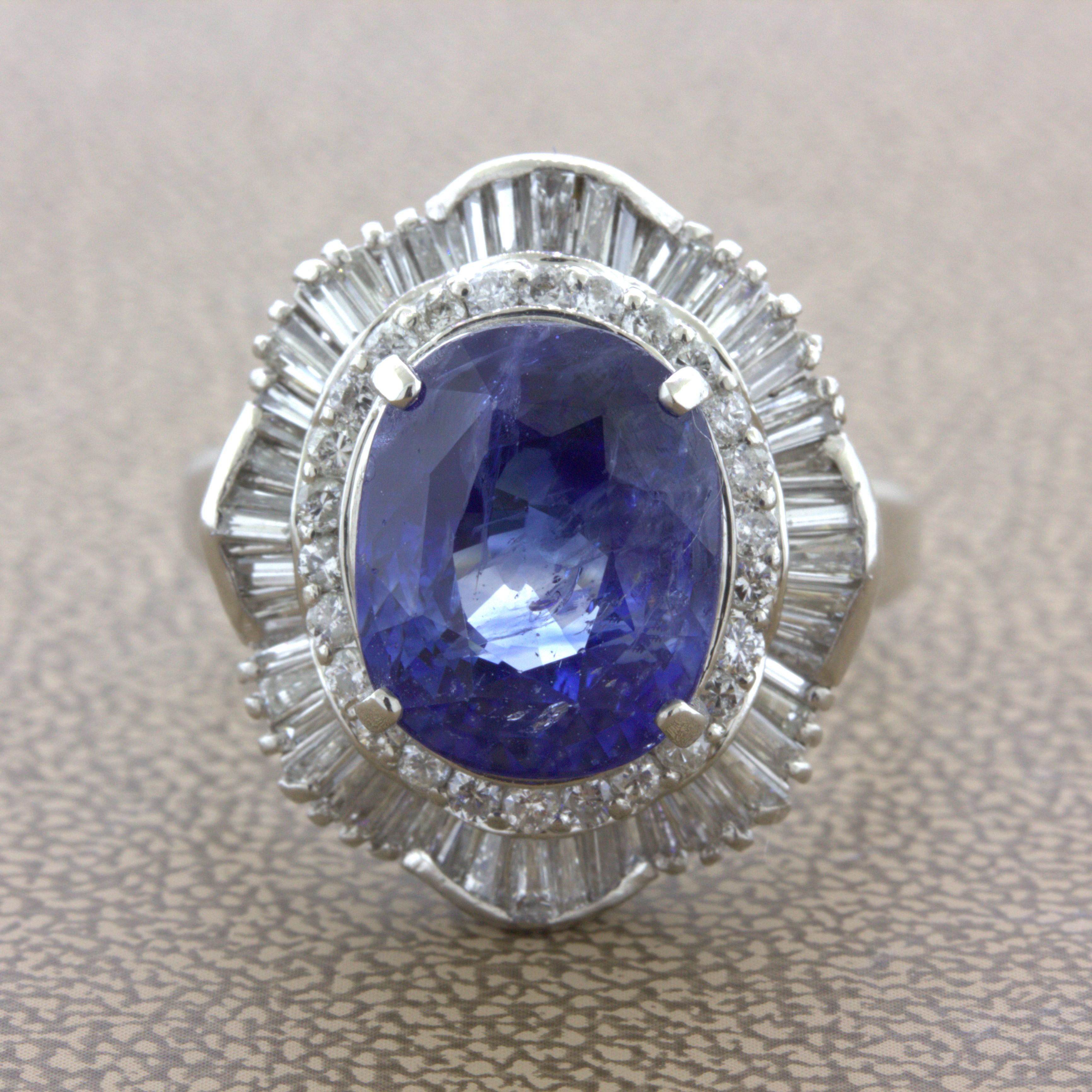 A bright and beautiful blue sapphire takes center stage. It weighs 7.94 carats and has great color with excellent light return. It is complemented by 1.20 carats of round brilliant and baguette-cut diamonds set around the sapphire in a stylish