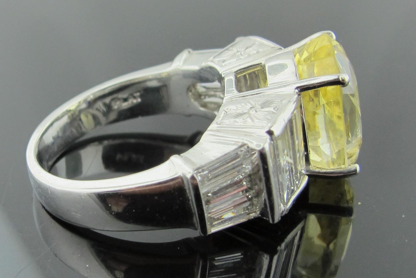Oval Cut 7.94 Carat Natural Yellow Sapphire with 3.00 Carat of Diamonds Set in Platinum