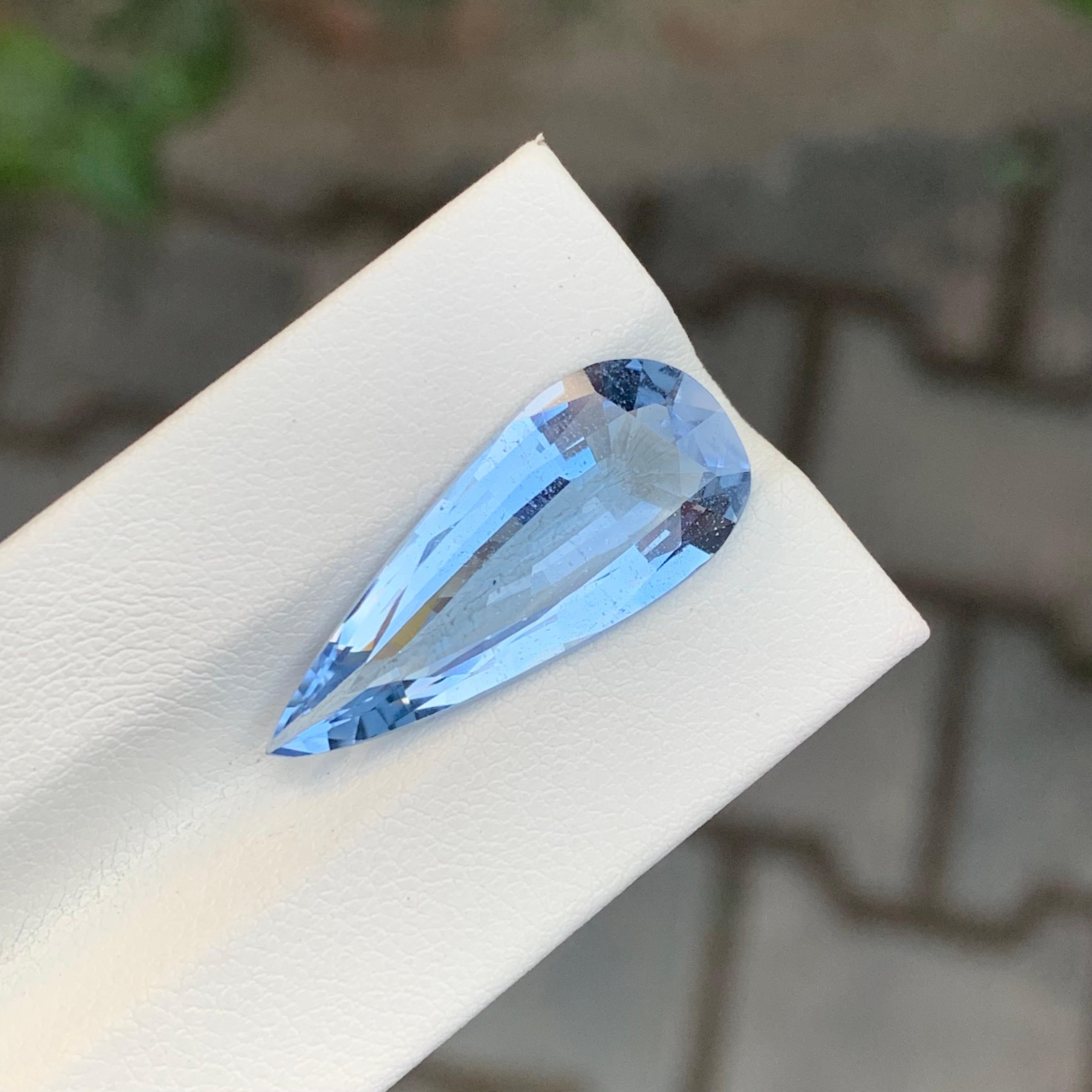 Faceted Goshenite

Weight: 7.95 Carats
Dimension: 25 x 10.7 x 5.8 Mm
Origin: Pakistan
Shape: Long Pear 
Color: Blue
Certficate; On Customer Demand
.
Goshenite, a captivating and pristine gemstone, belongs to the beryl mineral family, which also