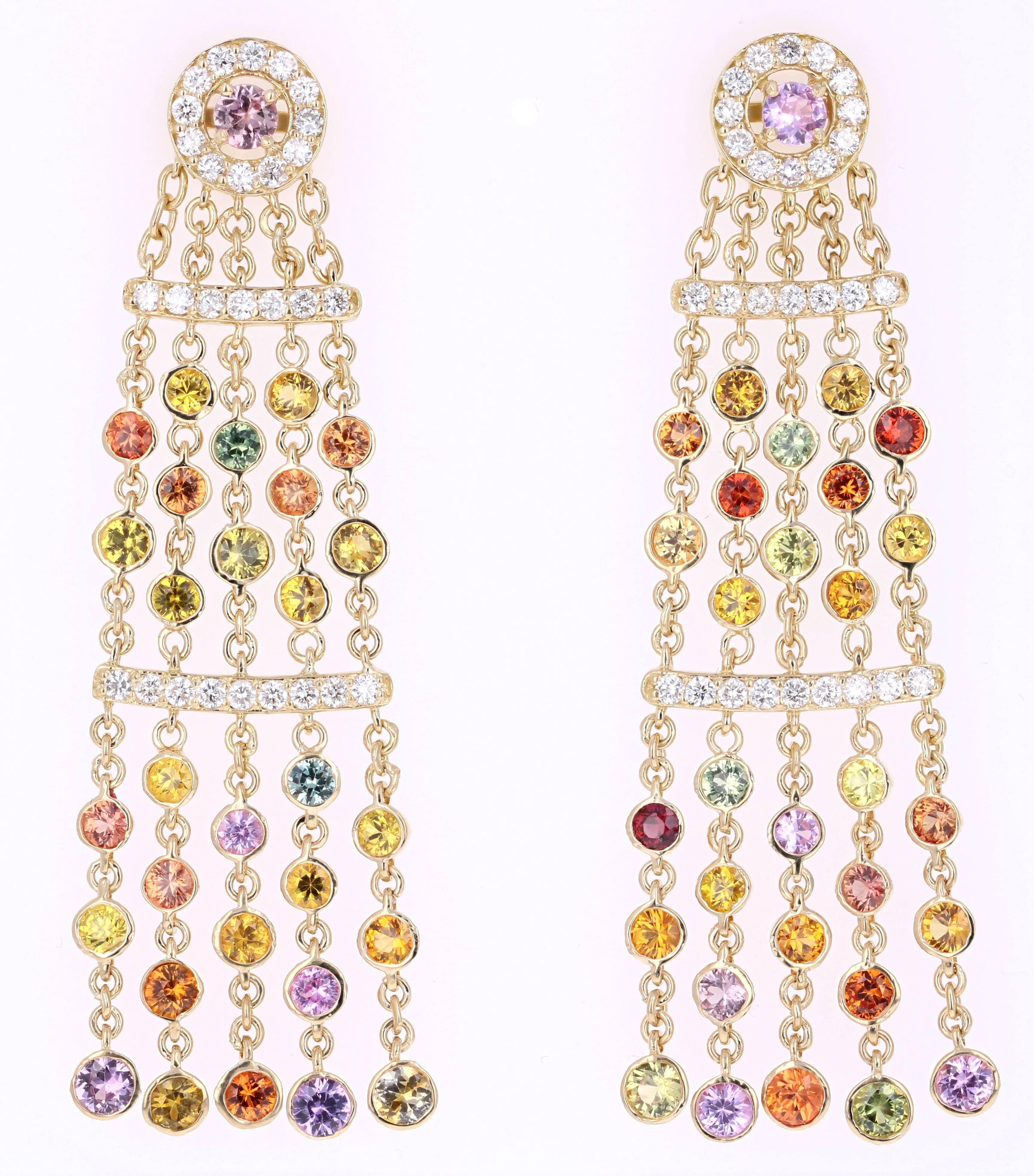 7.95 Carat Multi-Colored Sapphire Diamond Dangle Yellow Gold Earrings!!

Gorgeous is simply an understatement!!! These beautiful earrings have 60 Round Cut Multi-Colored Sapphires that are falling like a delicate rain fall and weigh 6.70 carats.