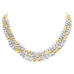 79.50 Total Carat Weight Mixed Cut Fancy Intense Yellow and White Diamonds