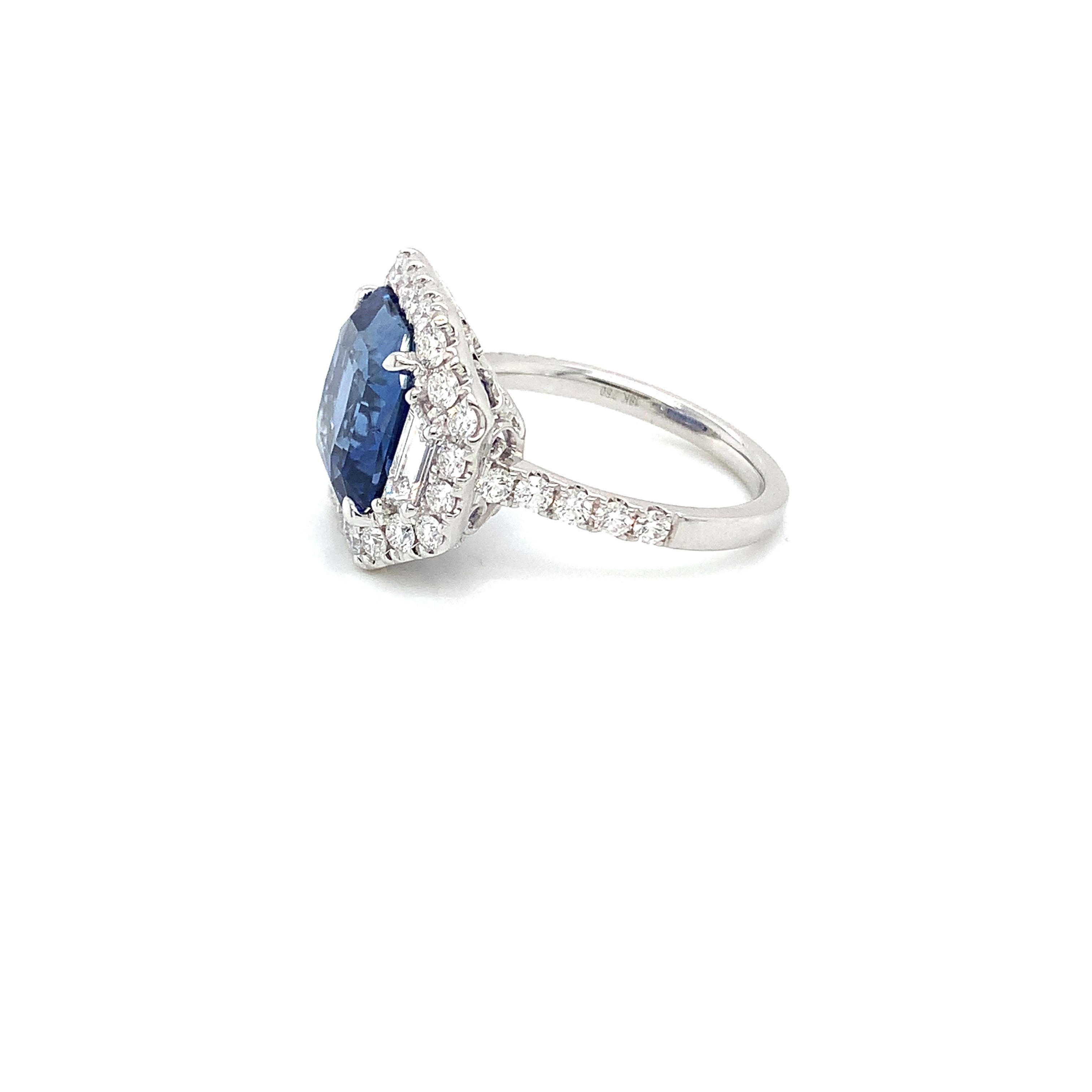 Emerald Cut 7.96 Carat Blue Sapphire & Diamond Ring in 18 Karat White Gold For Sale