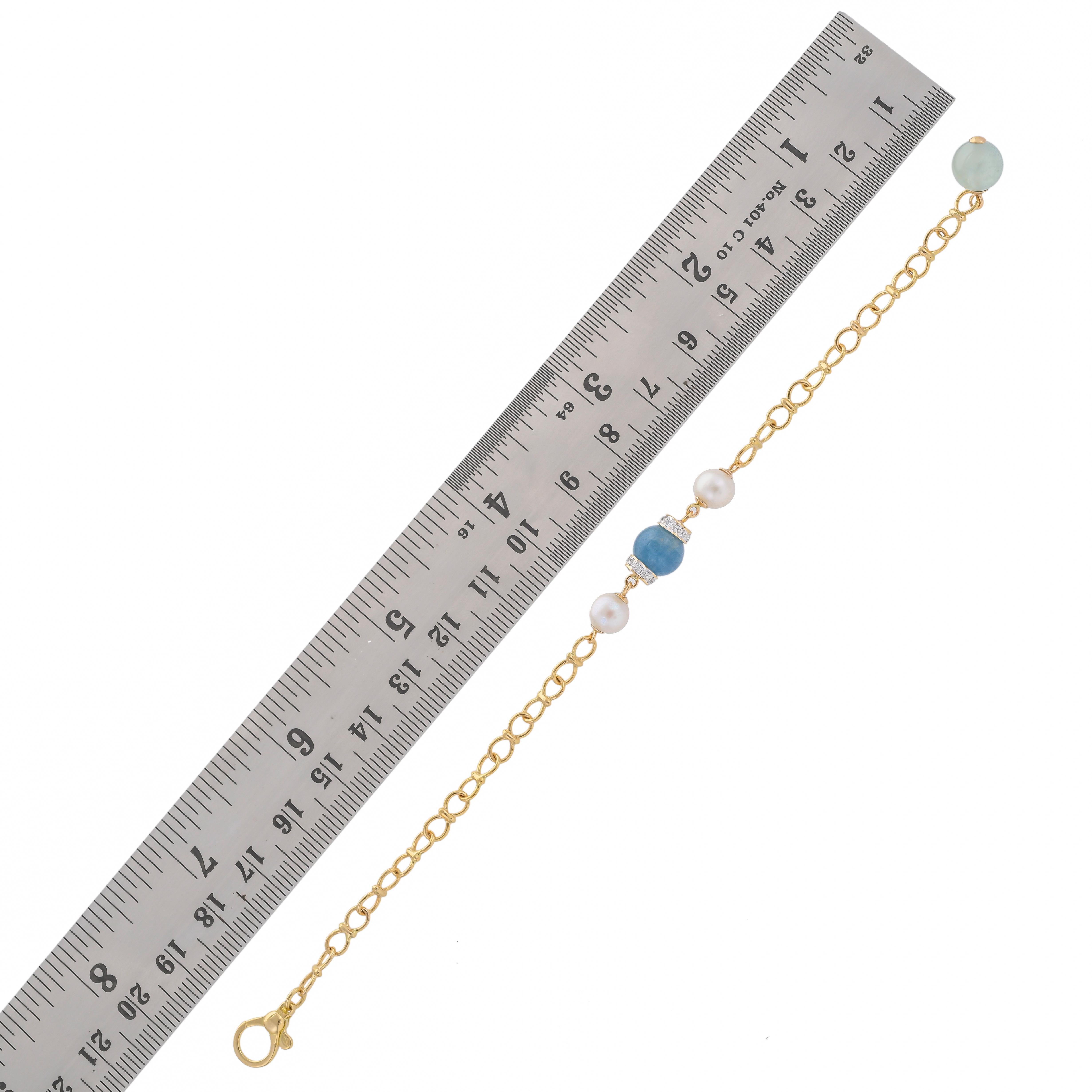 Design to encourage love, this simple but delicate bracelet is handcrafted in 18 karats yellow gold, it is a perfect combination of blue and green aquamarine ball weighing approximately 7.97 carats sprinkled with 0.19 carats diamonds and 4.11 carats