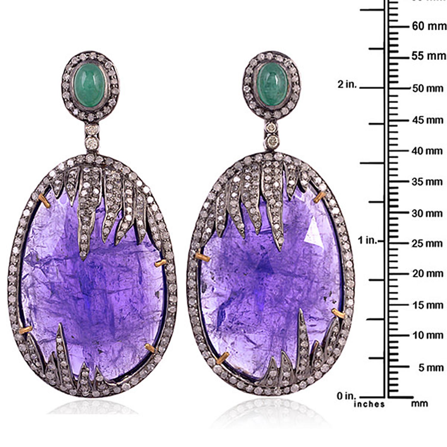 Contemporary 79.7ct Tanzanite Dangle Earrings With Emerald & Diamonds Made in 18k White Gold For Sale