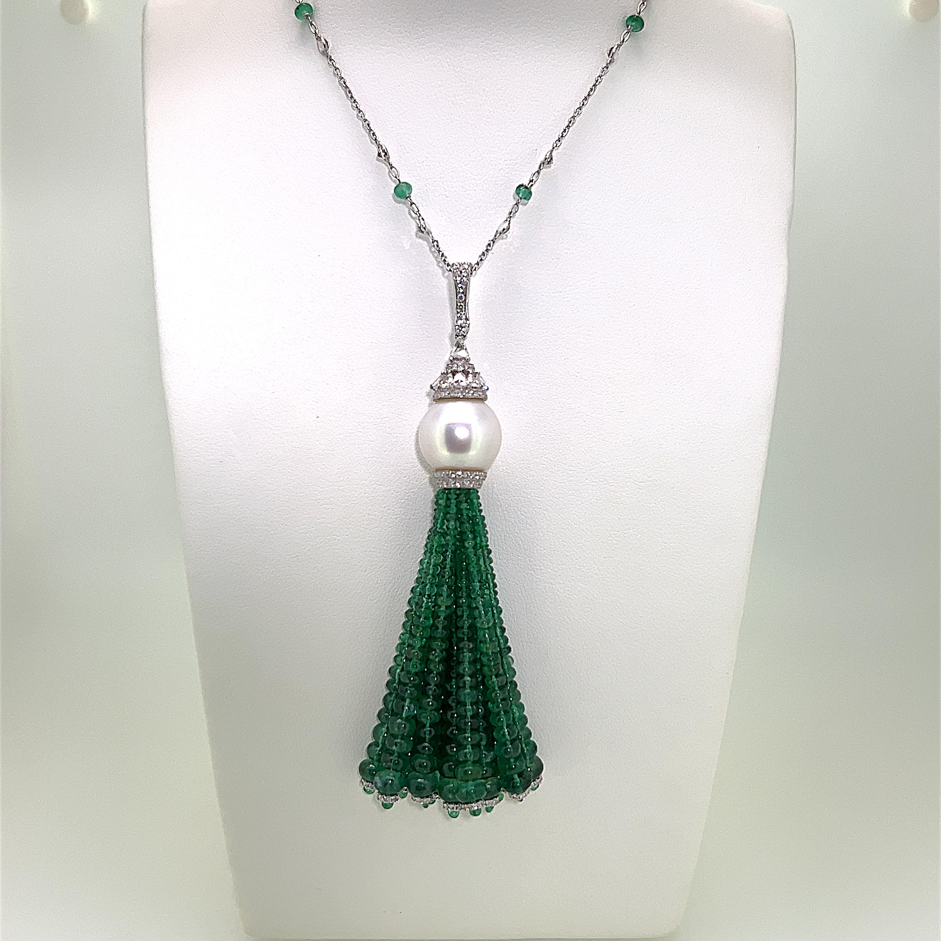 This is a gorgeous looking Emerald, Cultured Pearl and Diamond Tassel Necklace weighing 79.84 carats in total.  This remarkable piece features glimmering Emerald beads with various cut and sizes of Emerald and Diamonds set on 18 Karat White Gold. 