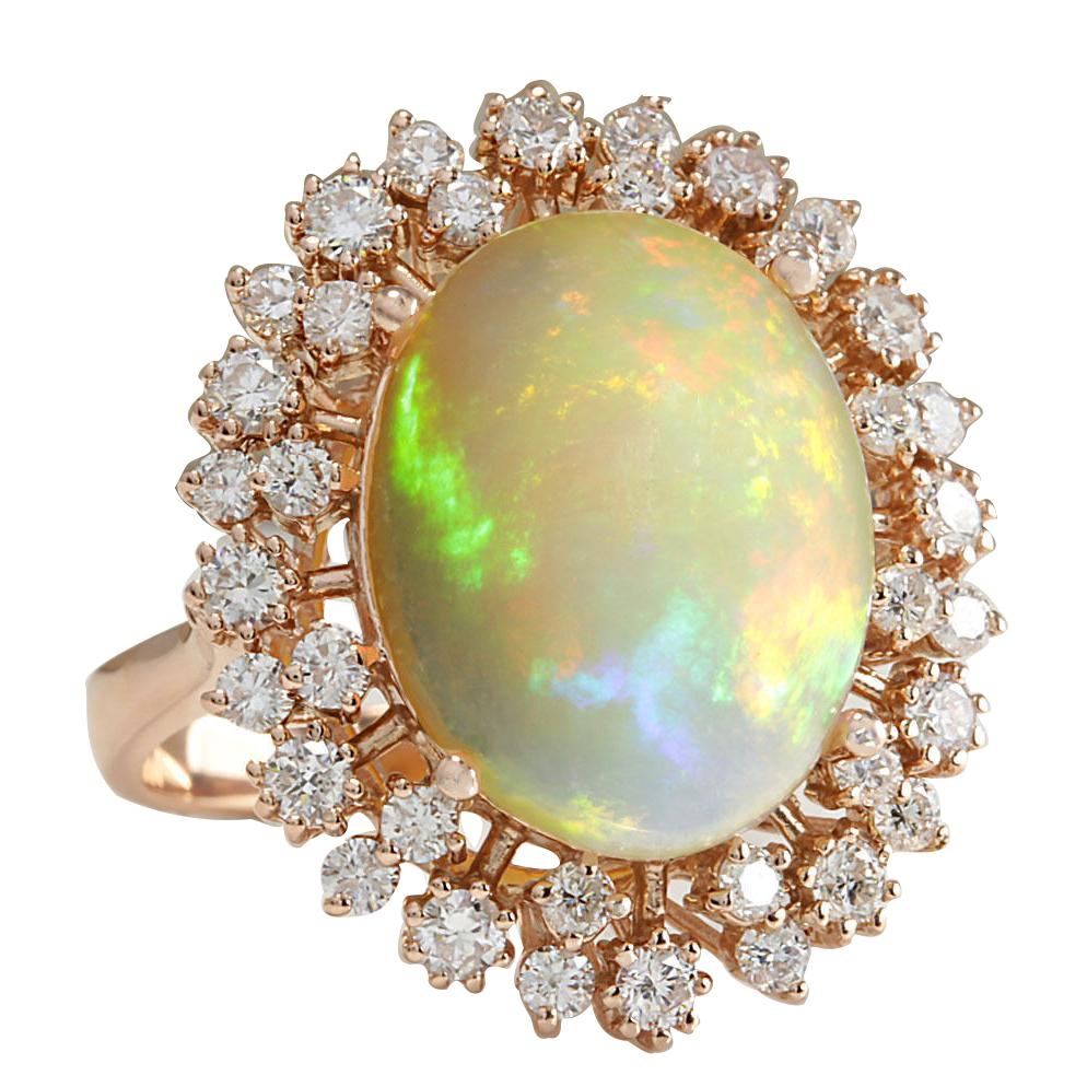 Stamped: 14K Rose Gold
Total Ring Weight: 8.2 Grams
Total Natural Opal Weight is 6.81 Carat (Measures: 16.00x12.00 mm)
Color: Multicolor
Total Natural Diamond Weight is 1.18 Carat
Color: F-G, Clarity: VS2-SI1
Face Measures: 25.40x21.70 mm
Sku: