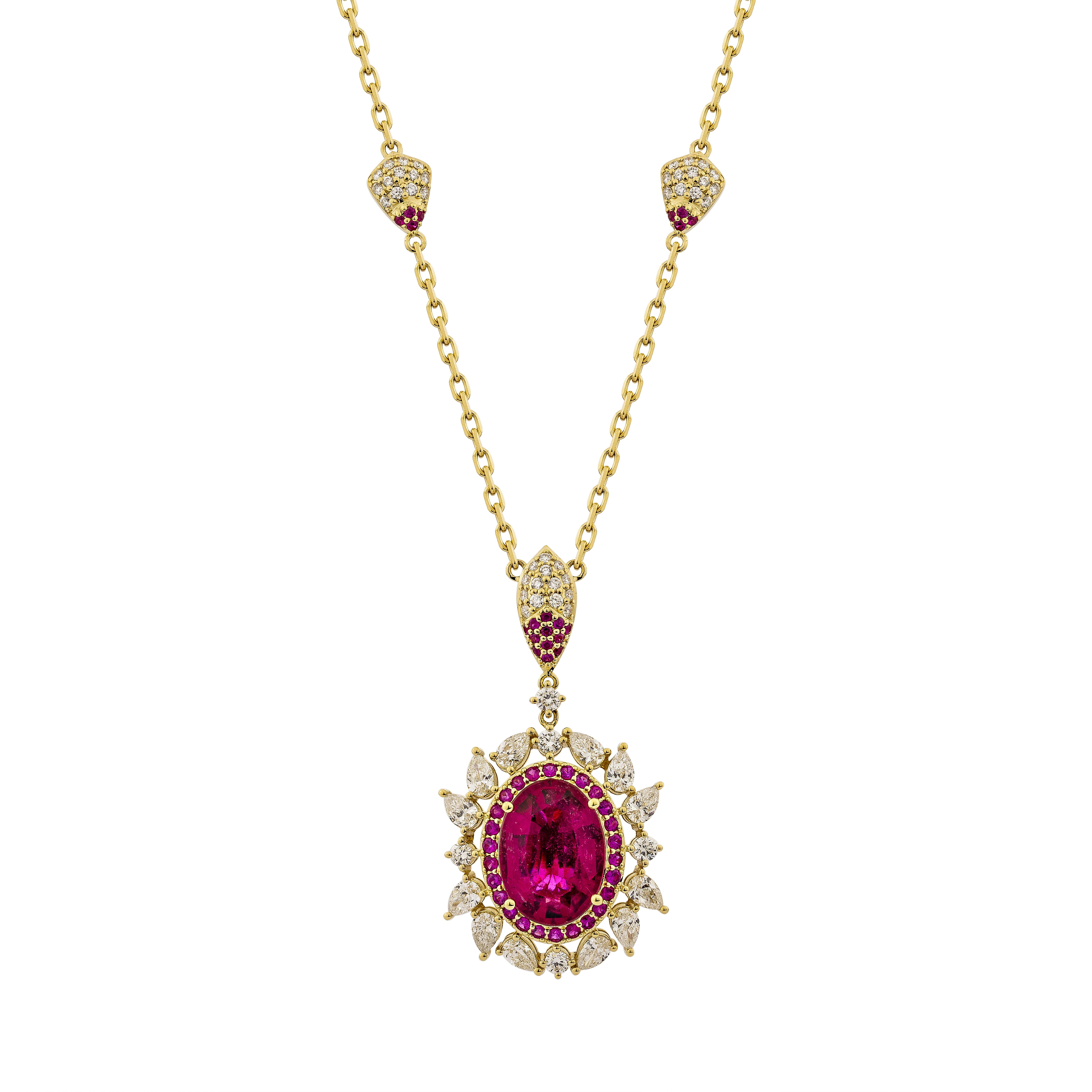 Sunita Nahata showcases an exquisite diamond studded Rubellite jewelry set that exudes grace and elegance. This exquisite 18Karat yellow gold set is ideal for any special occasion because it combines traditional elegance with modern
