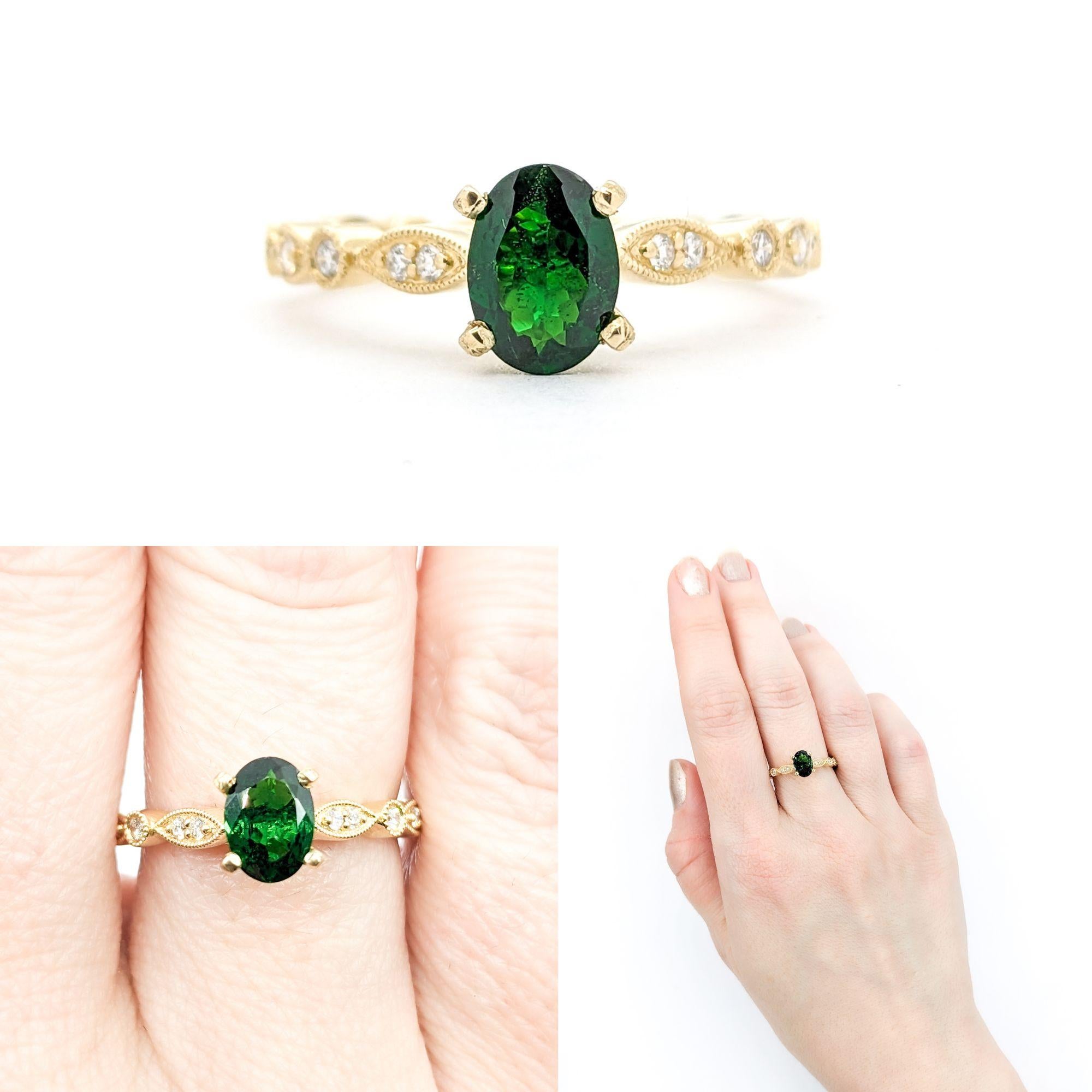 .79ct Tsavorite garnet & Diamond Ring In Yellow Gold

Introducing this elegant ring, meticulously crafted in 14kt yellow gold. It features a striking .79 carat green Tsavorite garnet centerpiece, beautifully accented by .18 carats of sparkling round