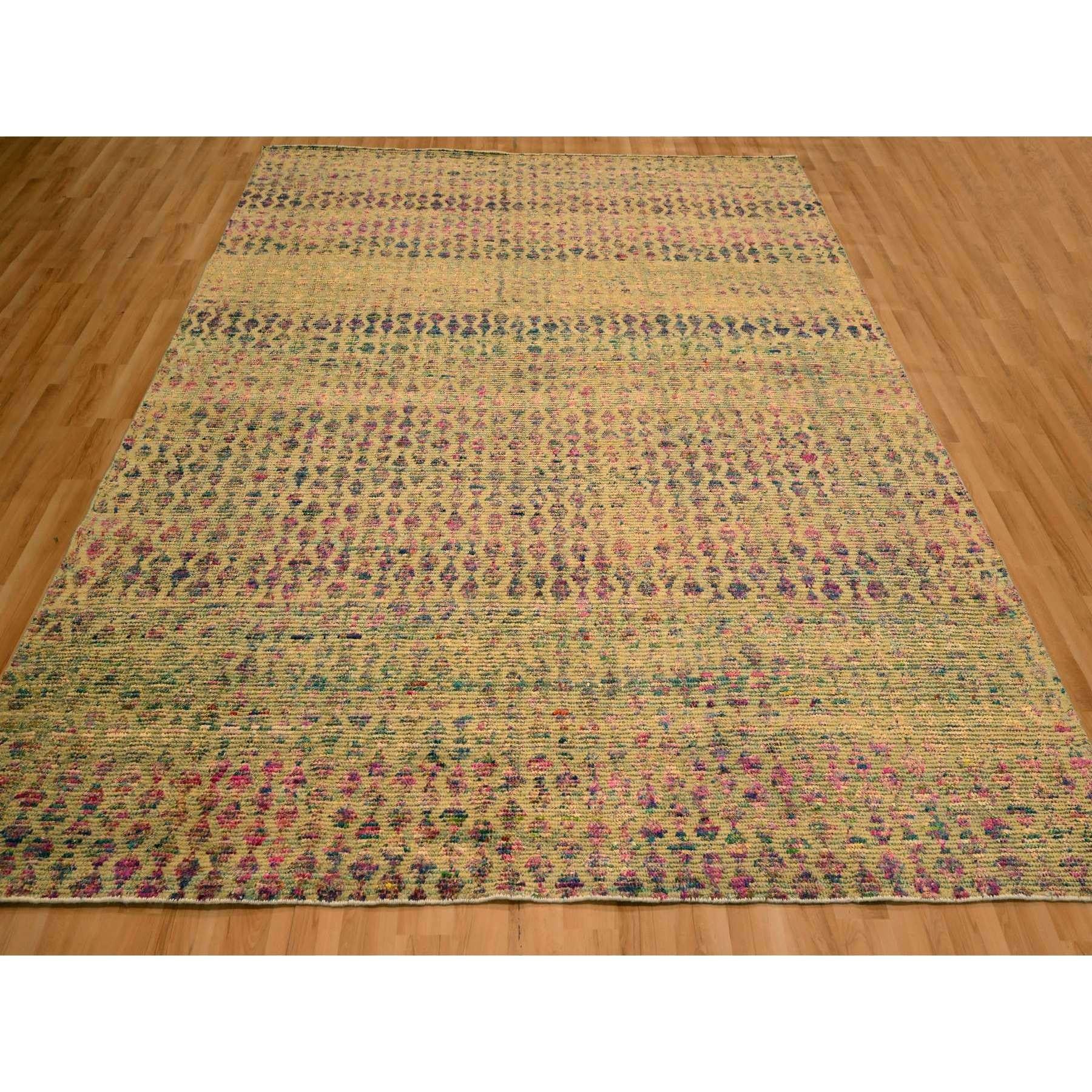 Burlywood Brown, Colorful Diamond Motif, Natural Wool with Sari Silk, Textured Pile, Hand Knotted, Oriental Rug
Primary materials: Wool & Sari Silk
Latex: No Pile 
height: 0.25 Inches
Style: Contemporary
Primary color: Brown
Secondary colors: Pink,