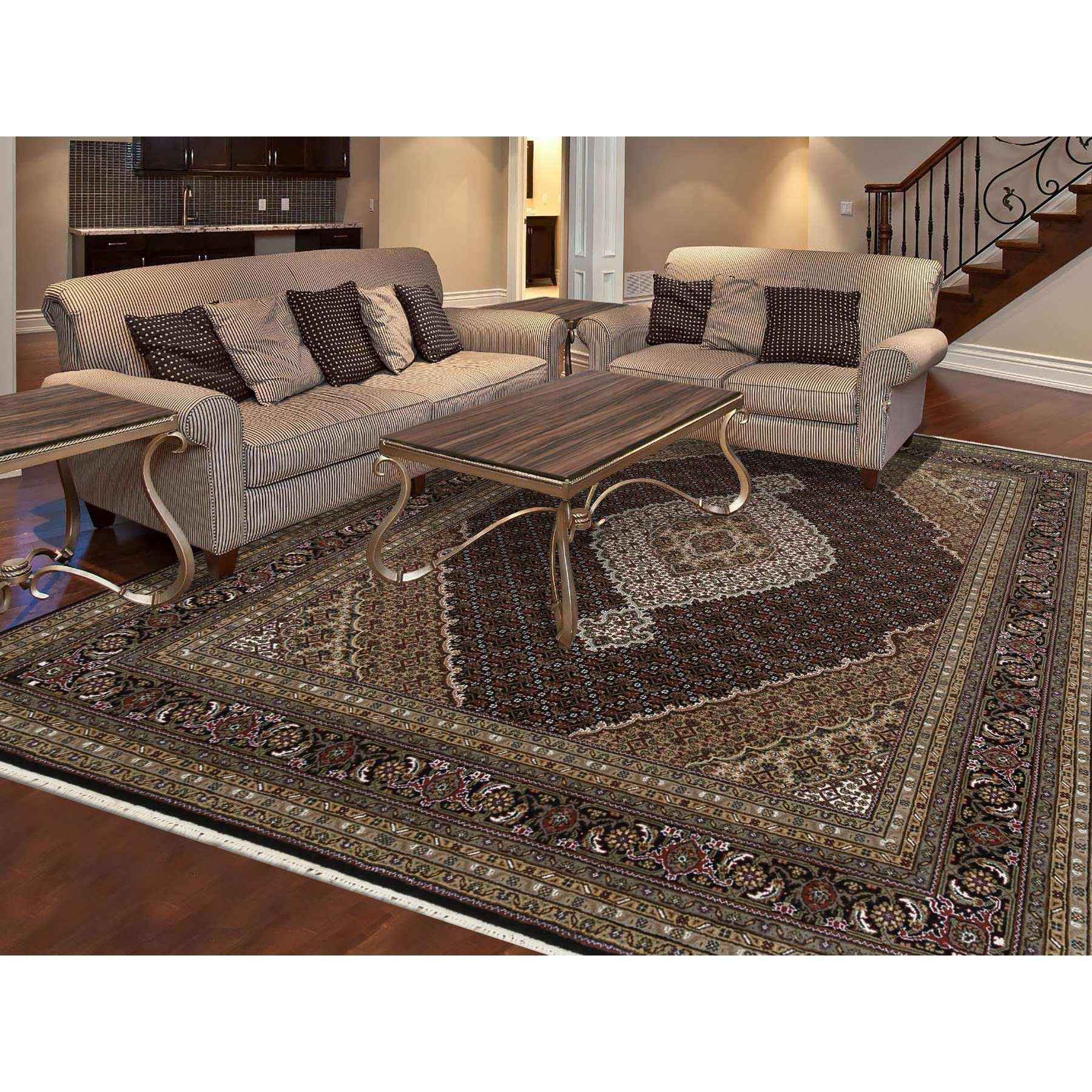 This is a truly genuine one-of-a-kind Rich Black, Tabriz Mahi with Fish Medallion Design, 175 KPSI Wool Hand Knotted, Oriental Rug. It has been Knotted for months and months in the centuries-old weaving craftsmanship techniques by expert