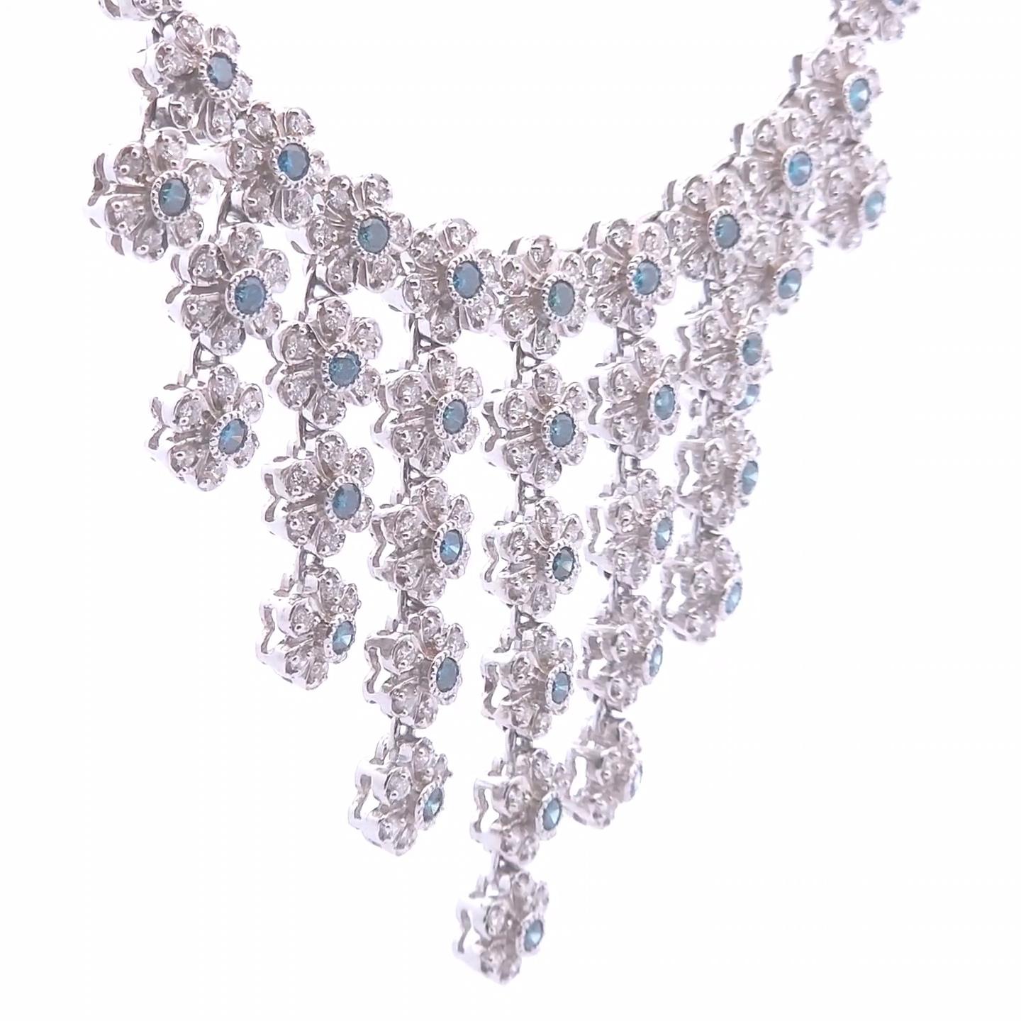 Laissez-vous séduire par l'élégance exquise de notre collier en diamant fantaisie de 6,91 ct, réalisé de main de maître en or blanc 14k. Cette pièce à couper le souffle met en valeur un superbe arrangement de diamants blancs ronds de 4,54ct,