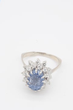 7ct Natural Pastel Sapphire with 24 Full Cut Diamonds