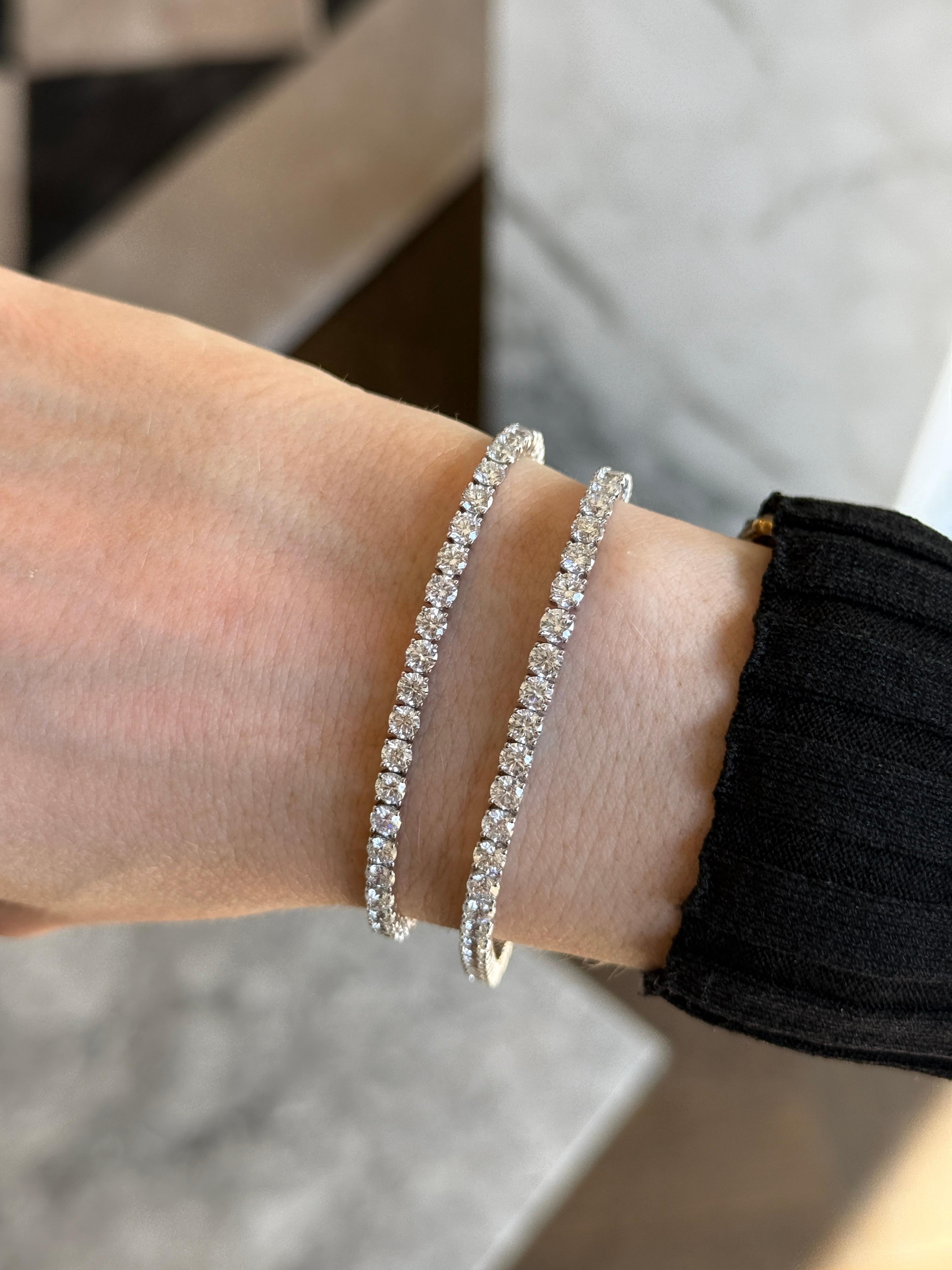A masterclass in refinement, this 6.5-inch diamond tennis bracelet is meticulously handcrafted in 18k white gold and set with 7.00 carats of individually matched round brilliant diamonds. Each stone weighs approximately 0.15ct and is of the highest
