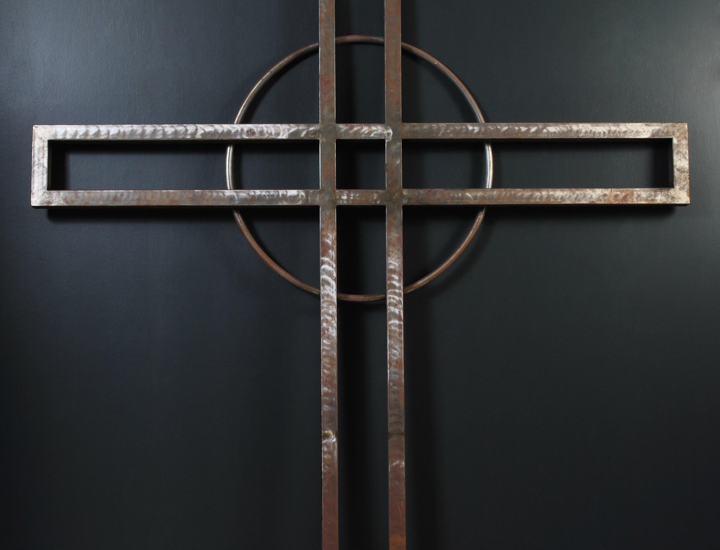 A huge 7ft 8” steel crucifix. Created in the modernist style circa 1970’s. This enormous steel cross was an unfinished project rescued from a now defunct chapel in northern England. 
Wonderfully bold decorative piece.