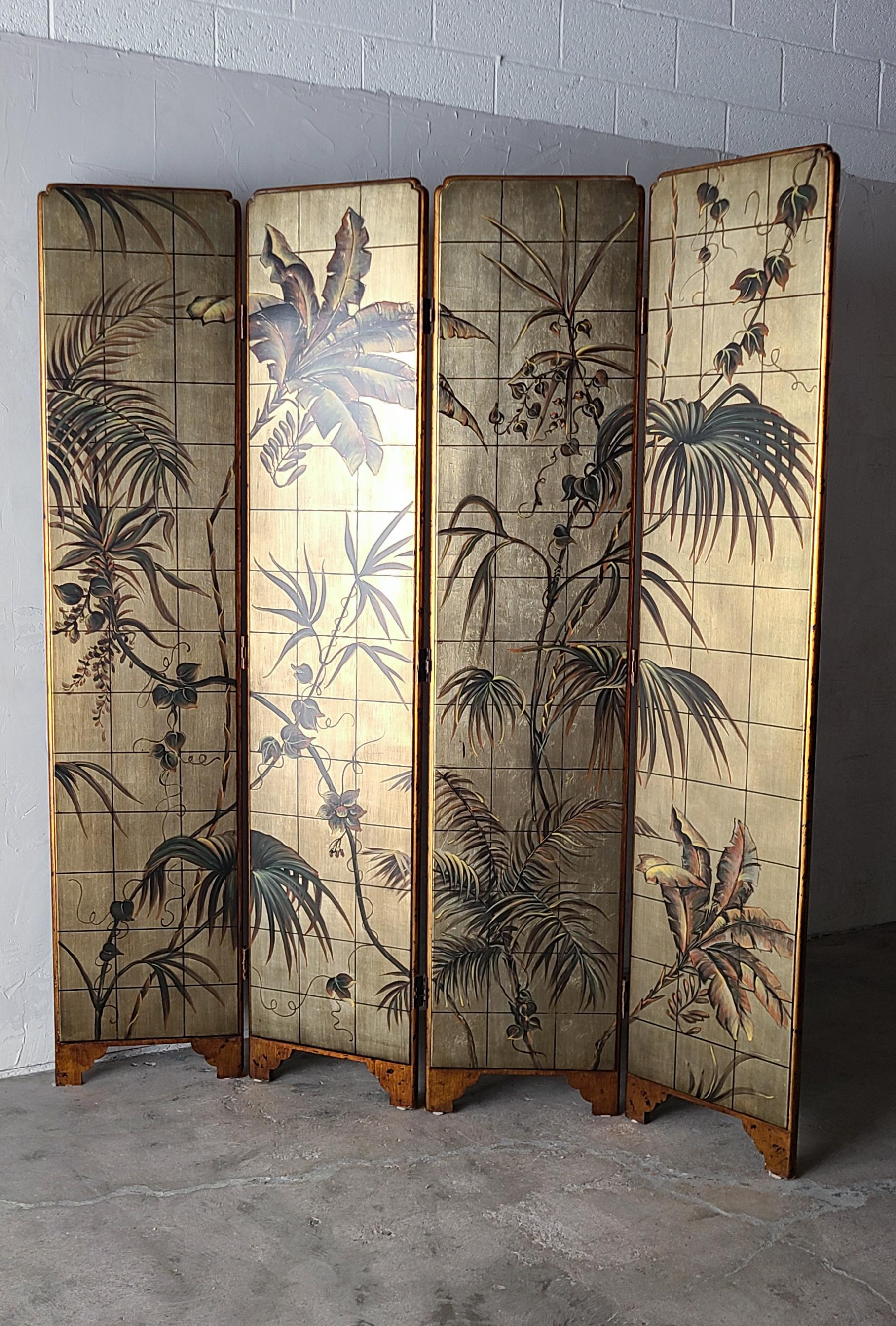 Absolutely stunning, 7 foot, folding four-panel, tropical botanical screen. The divider features four hand painted wood panels displaying a beautiful tropical botanical theme.  The details on this thing are incredible, creating depth and interest. 