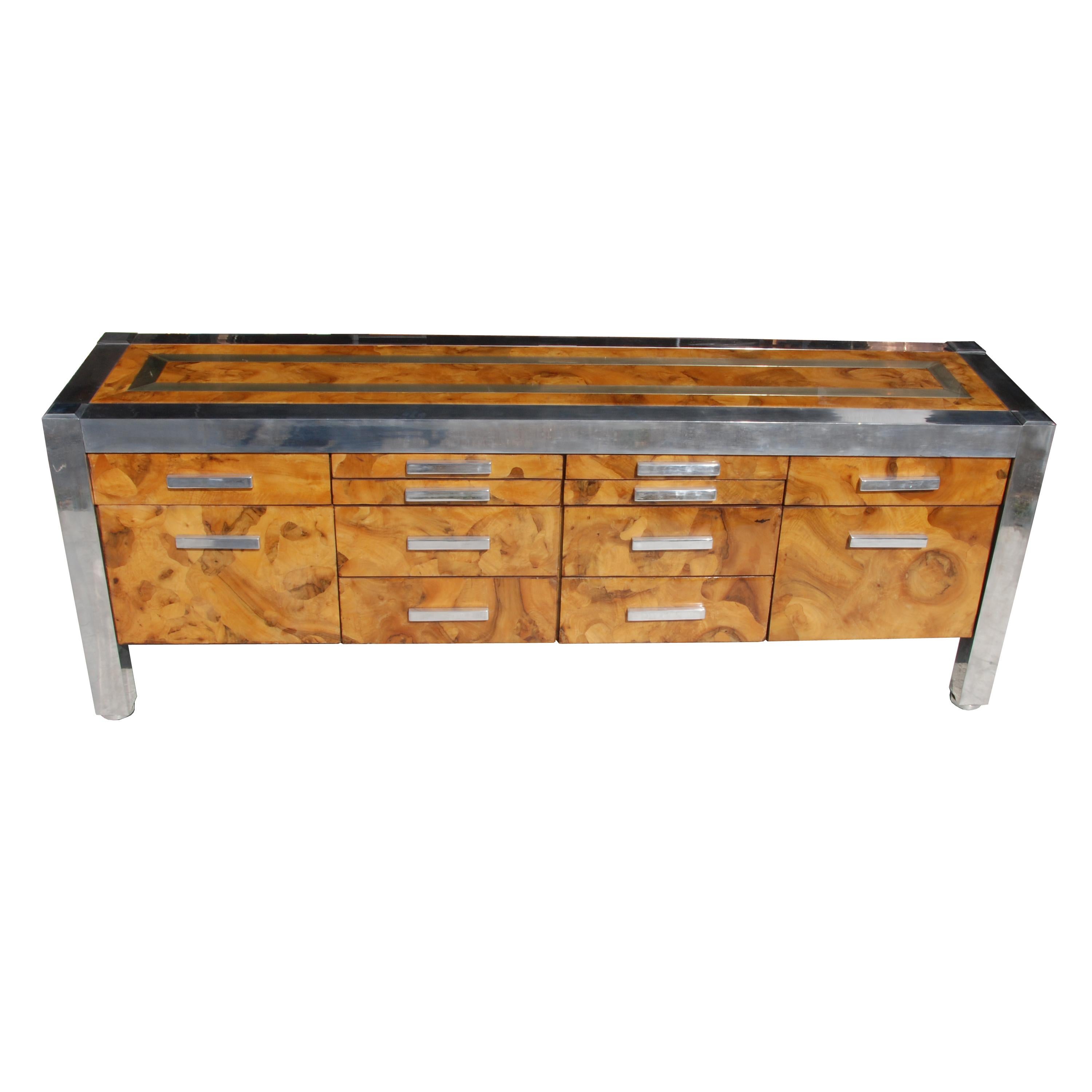 Pace Collection burled wood and chrome credenza

Features chrome detailing, and a light burled wood. 
Has ample storage space, 12 drawers.

  