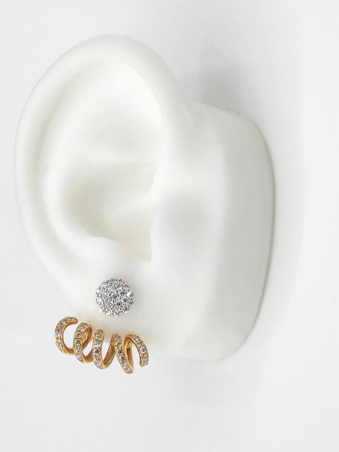 Can be worn separately.

Diamond Clustered Studs
Metal: 18K White Gold
Diamond: round brilliant, 0.44 ct

Twirl Diamond Jackets
Metal: 18K Rose Gold
Diamond: round brilliant, 0.58 ct